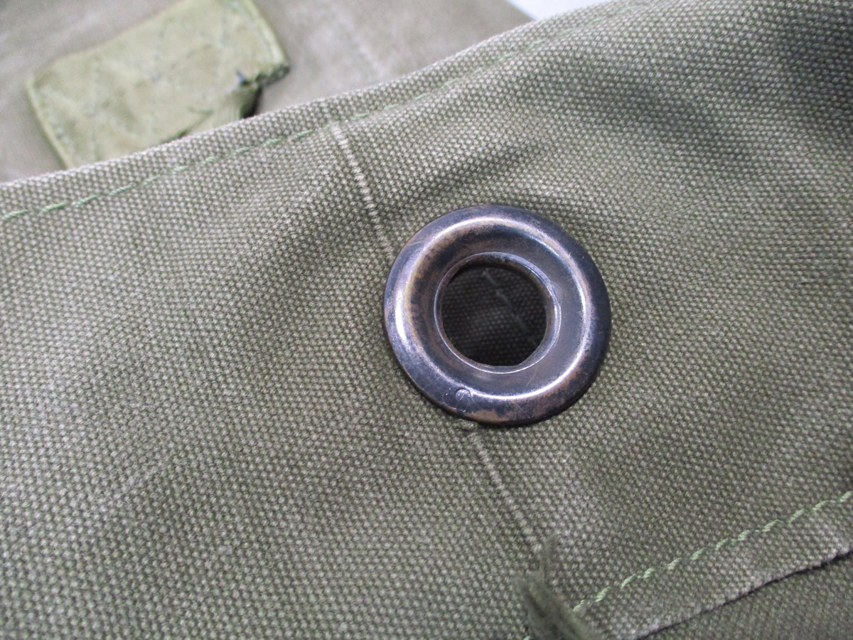 USGI 1980s OD Green cotton canvas duffel sea bag with rugged military surplus design, used condition.