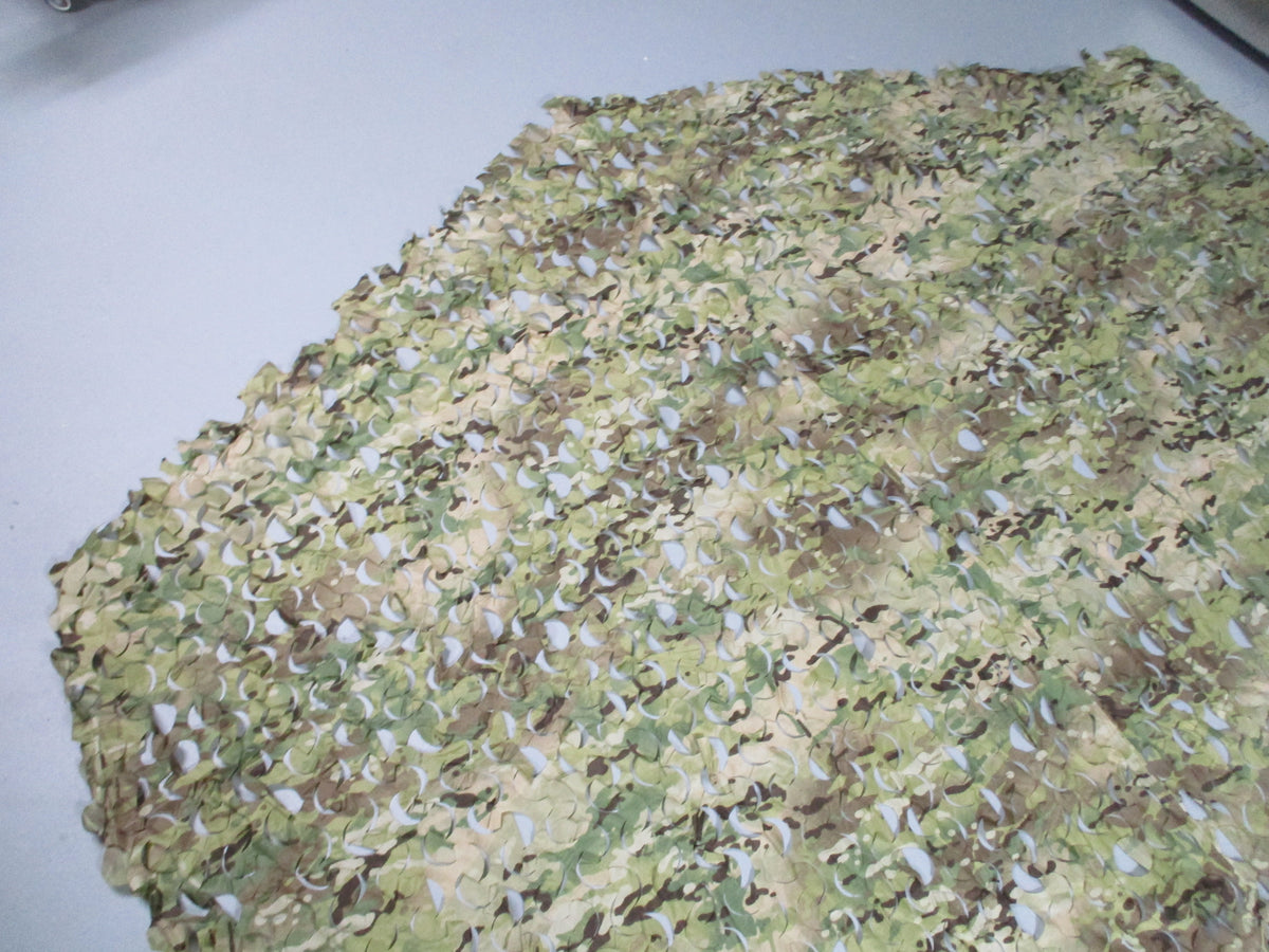 Camouflage netting leaf cut ripstop hunting blind cover, approximately 10x7 feet, unbranded