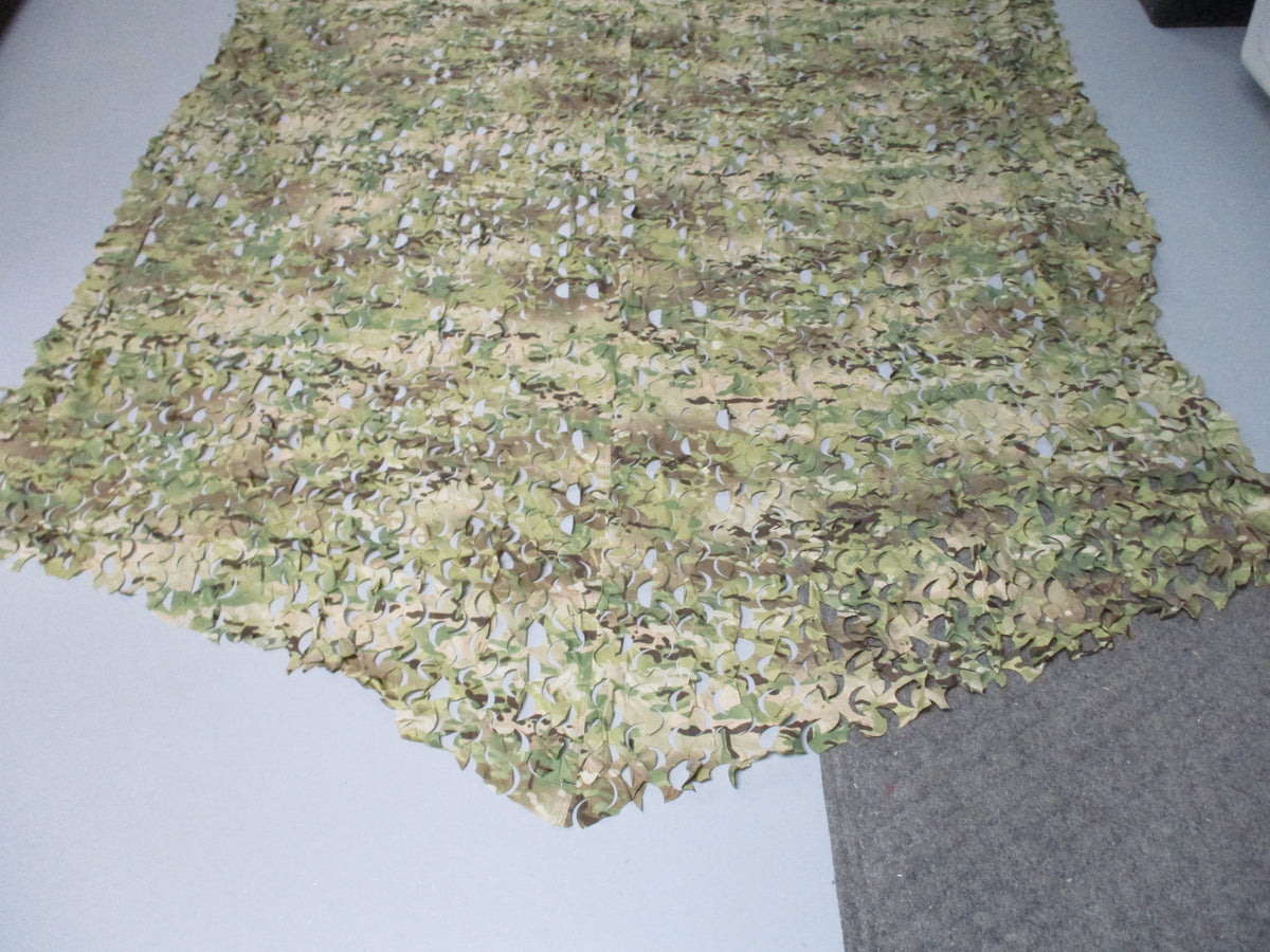 Unbranded leaf-cut camouflage netting, approximately 10 x 7 ft.
