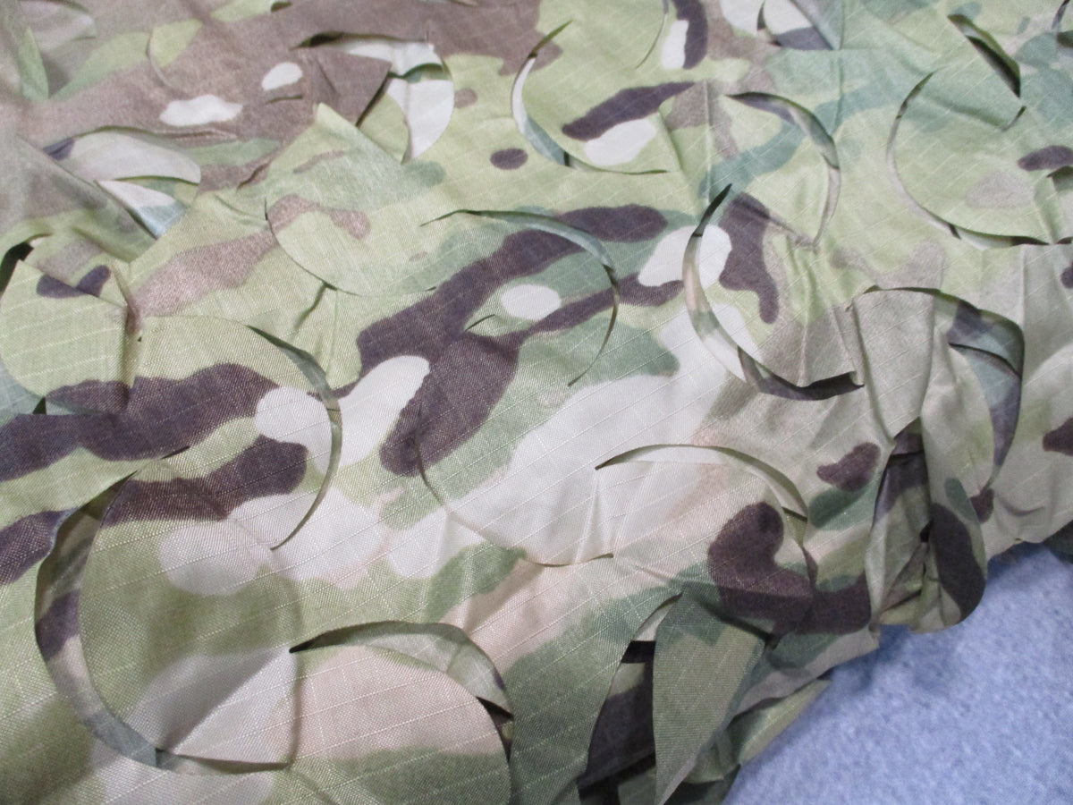 Camouflage netting hunting blind cover, leaf-cut ripstop material, approximately 10x7 ft, unbranded