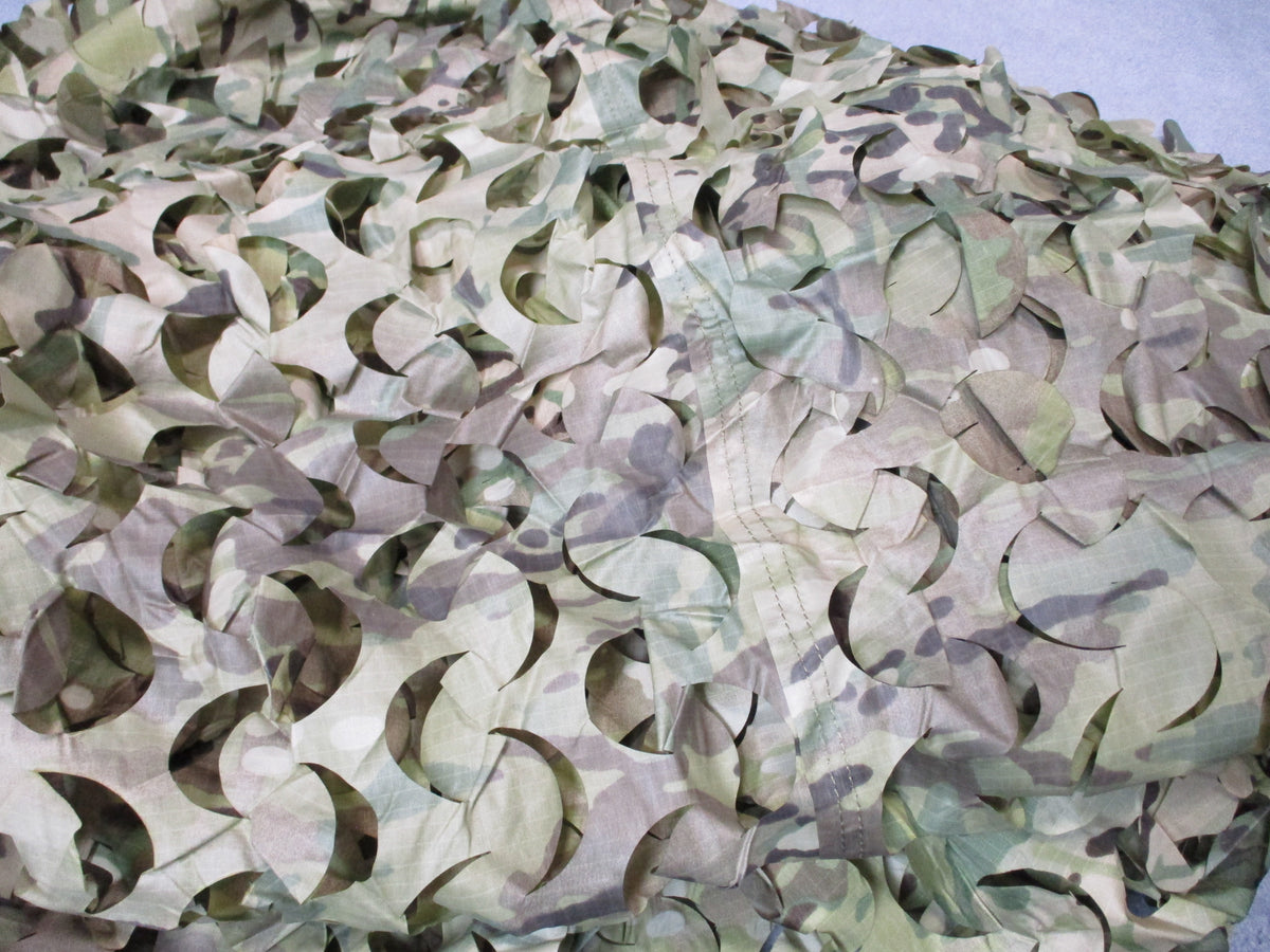 Camouflage netting leaf cut ripstop hunting blind cover, approximately 10x7 feet, unbranded