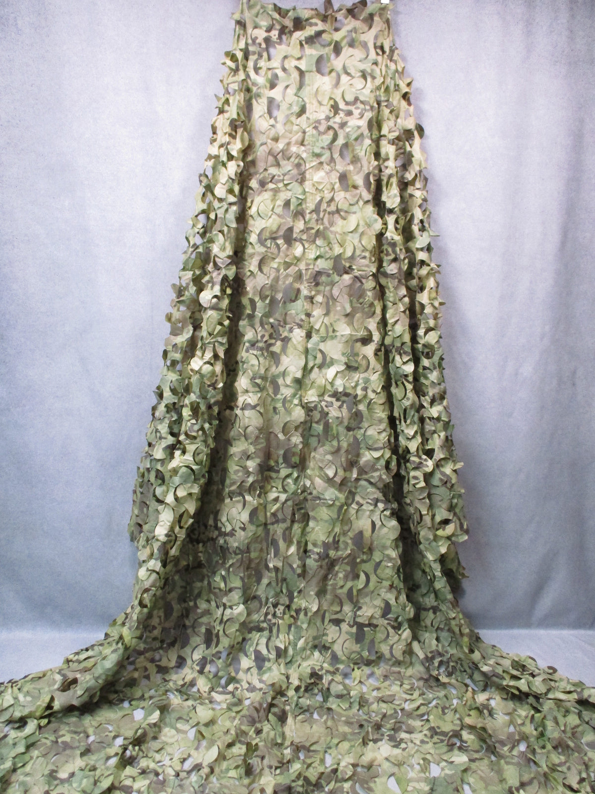Camouflage netting with leaf cut ripstop design, approximately 10x7ft hunting blind cover