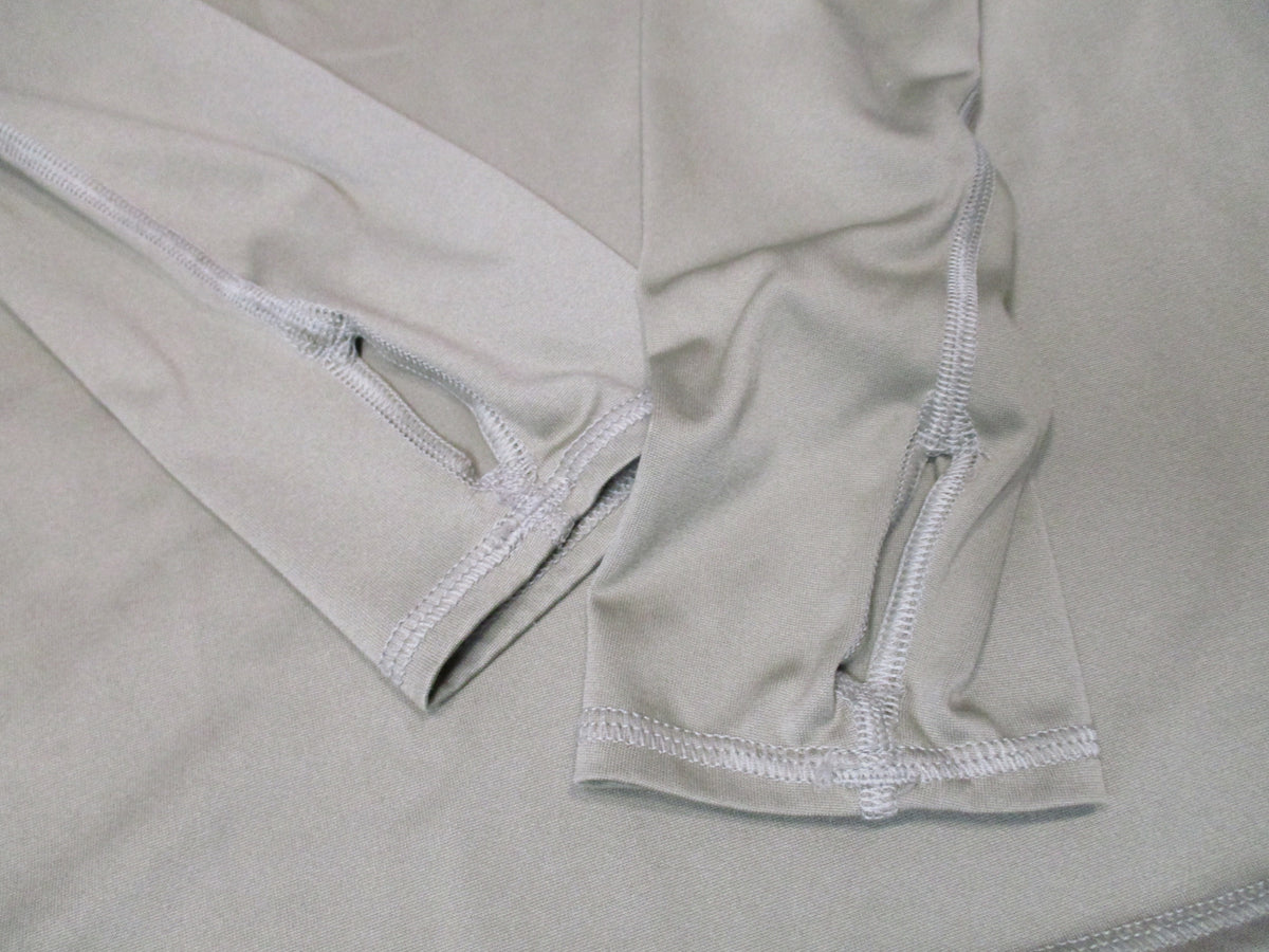 Milliken military silkweight base layer top in Tan 499, lightweight long-sleeve shirt shown flat lay