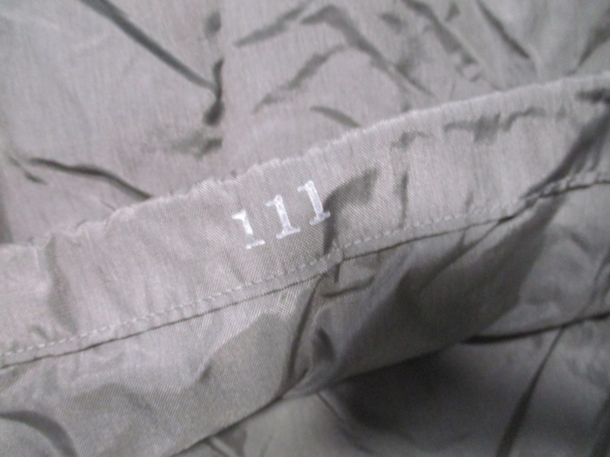 USGI US Army small compression stuff sack in urban gray, compact military gear bag with drawstring closure