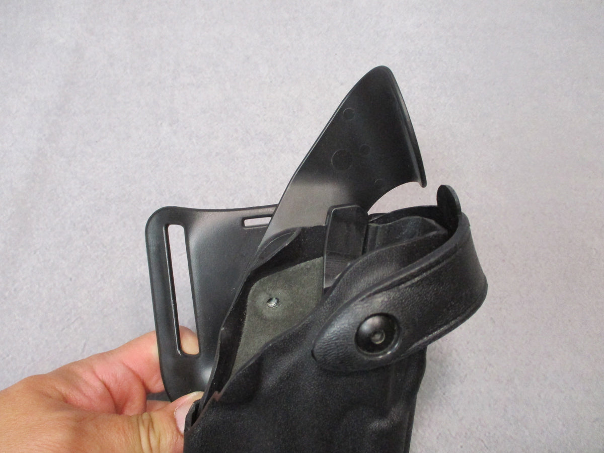 Safariland 6360-83 Glock 17/22 Level 3 duty holster in black with belt mount, designed for secure firearm retention.