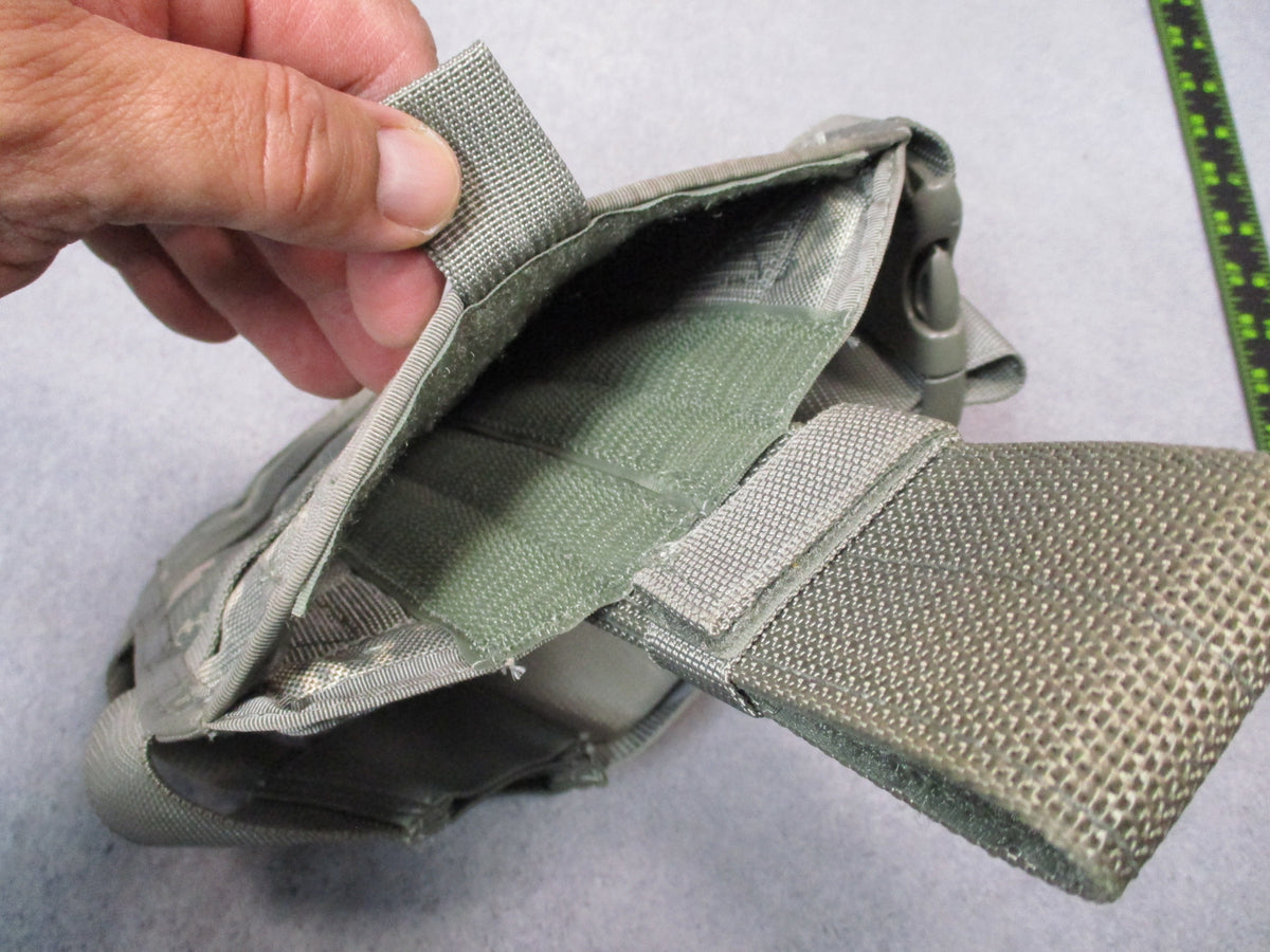 S.O.TECH ACU UCP MOLLE tactical drop leg thigh platform with adjustable straps and MOLLE attachment points for tactical gear.