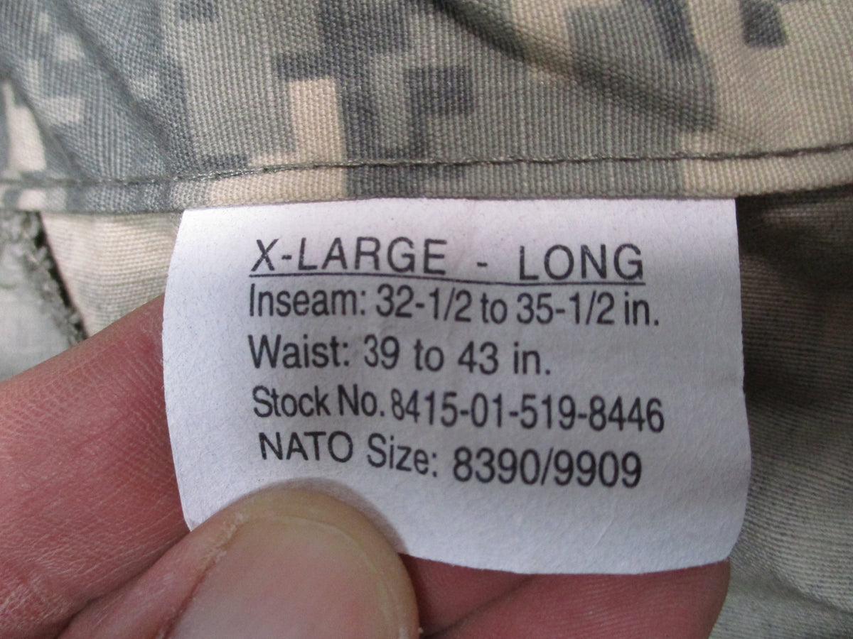 U.S. Army ACU UCP military combat trousers in size XL long, with camouflage pattern, durable fabric, and adjustable waist.