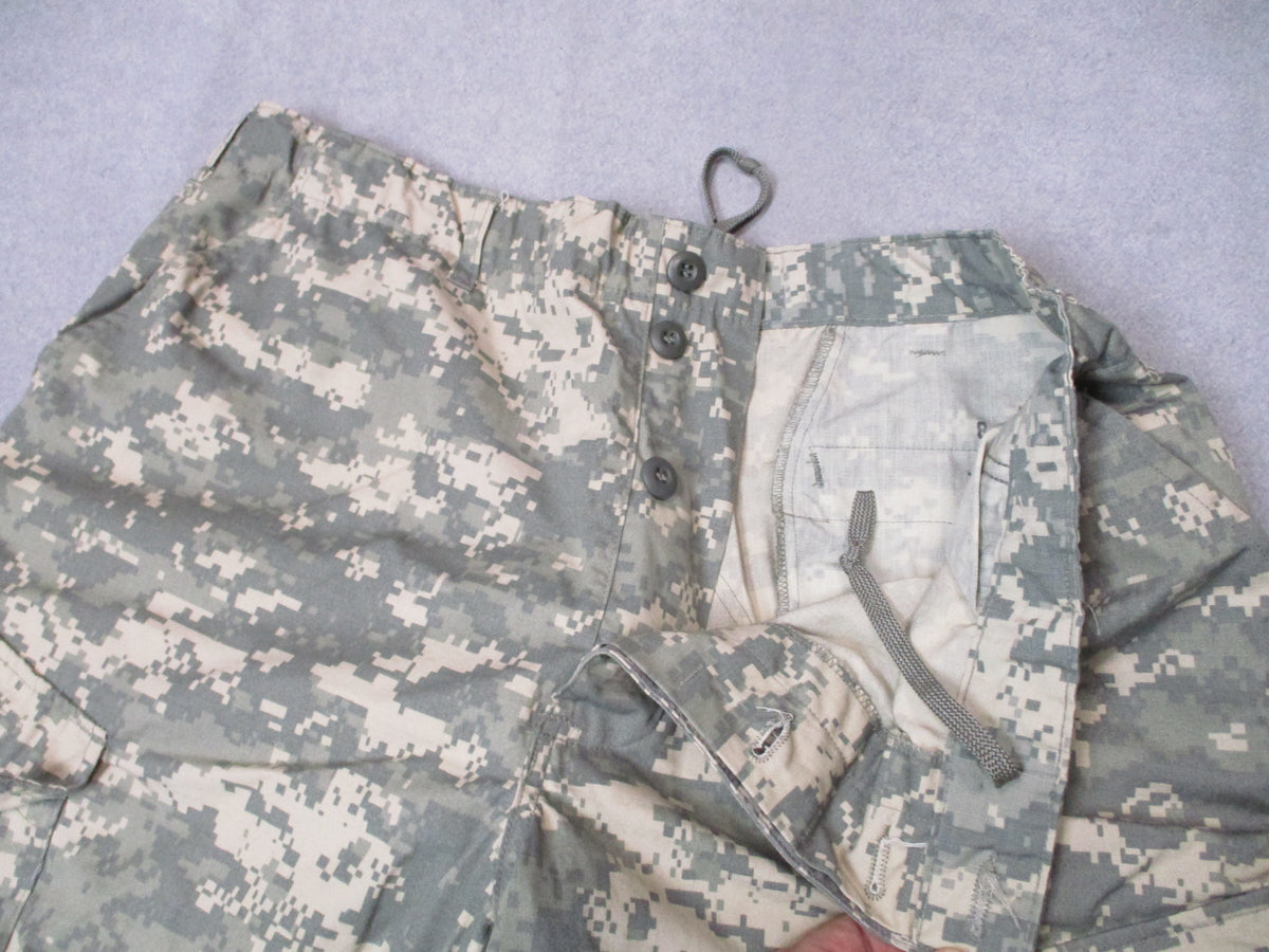 U.S. Army ACU UCP military combat trousers in size XL long, with a 39-43 inch waist and 32.5-35.5 inch inseam, displayed flat.