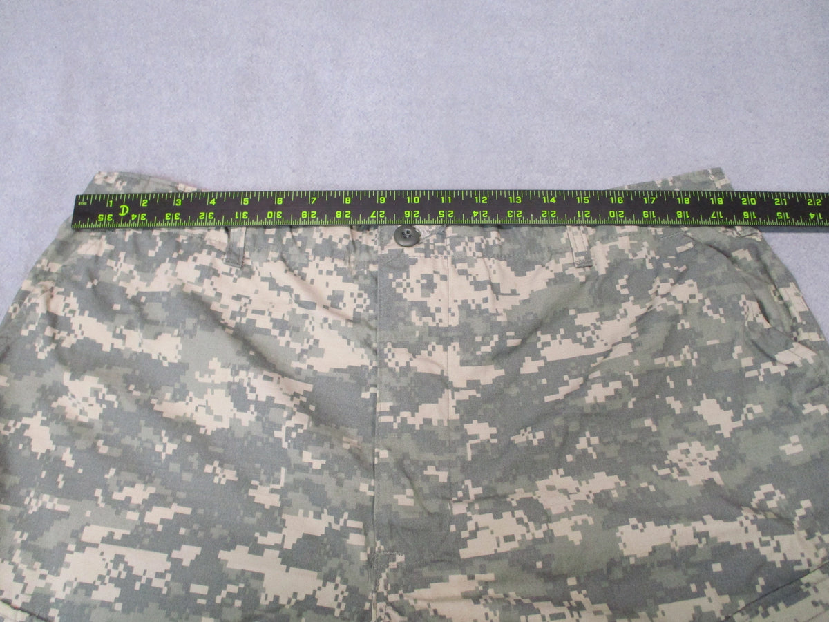 U.S. Army ACU UCP combat pants in XL long, showing durable military camouflage fabric with multiple pockets and reinforced stitching.