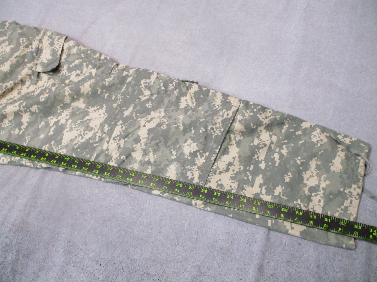 U.S. Army ACU UCP military combat trousers in XL long size, featuring camouflage pattern, multiple pockets, and tactical design.