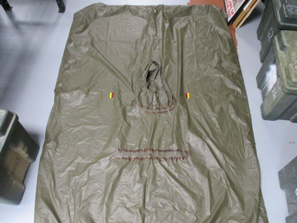 German Bundeswehr military OD green rain poncho, used camouflage rain cape with shelter features and durable fabric.