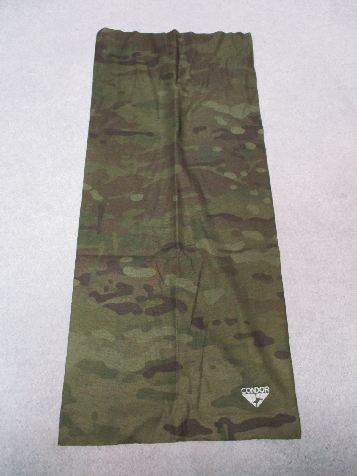 Condor MultiCam Black multi wrap neck gaiter and face cover headwear shown in camouflage pattern