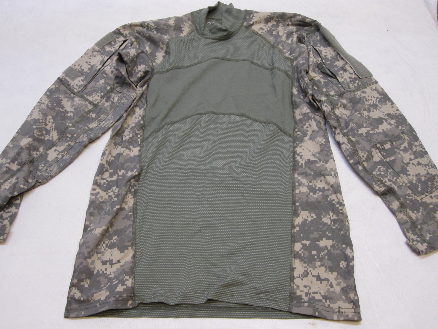 Digital camouflage combat shirt by Centex Military Gear, flame-resistant Army ACU uniform top in medium size, UCP pattern.