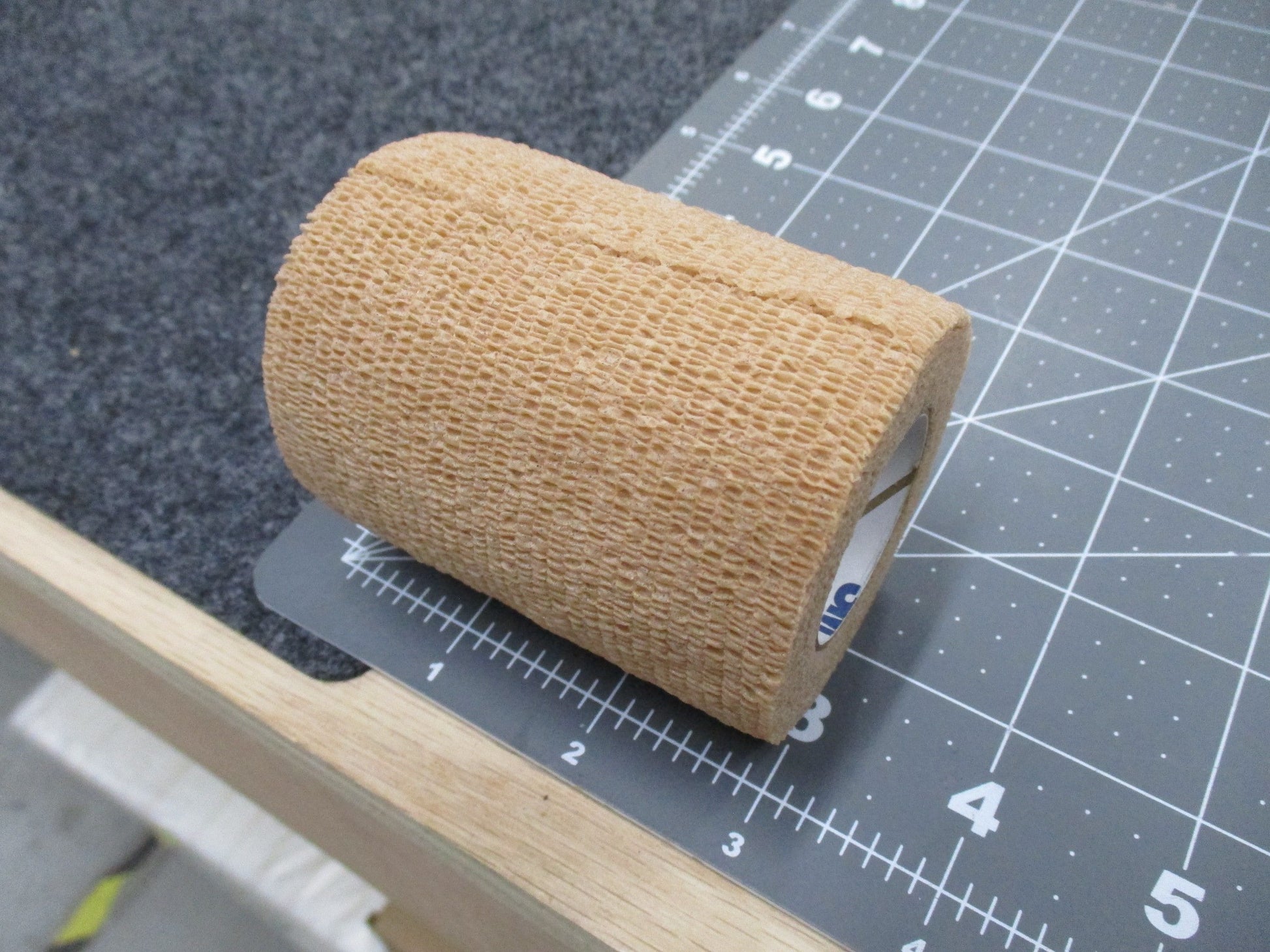 Two rolls of 3M Coban self-adherent wrap in tan, 3 inches wide by 5 yards long, displayed together on a white background.