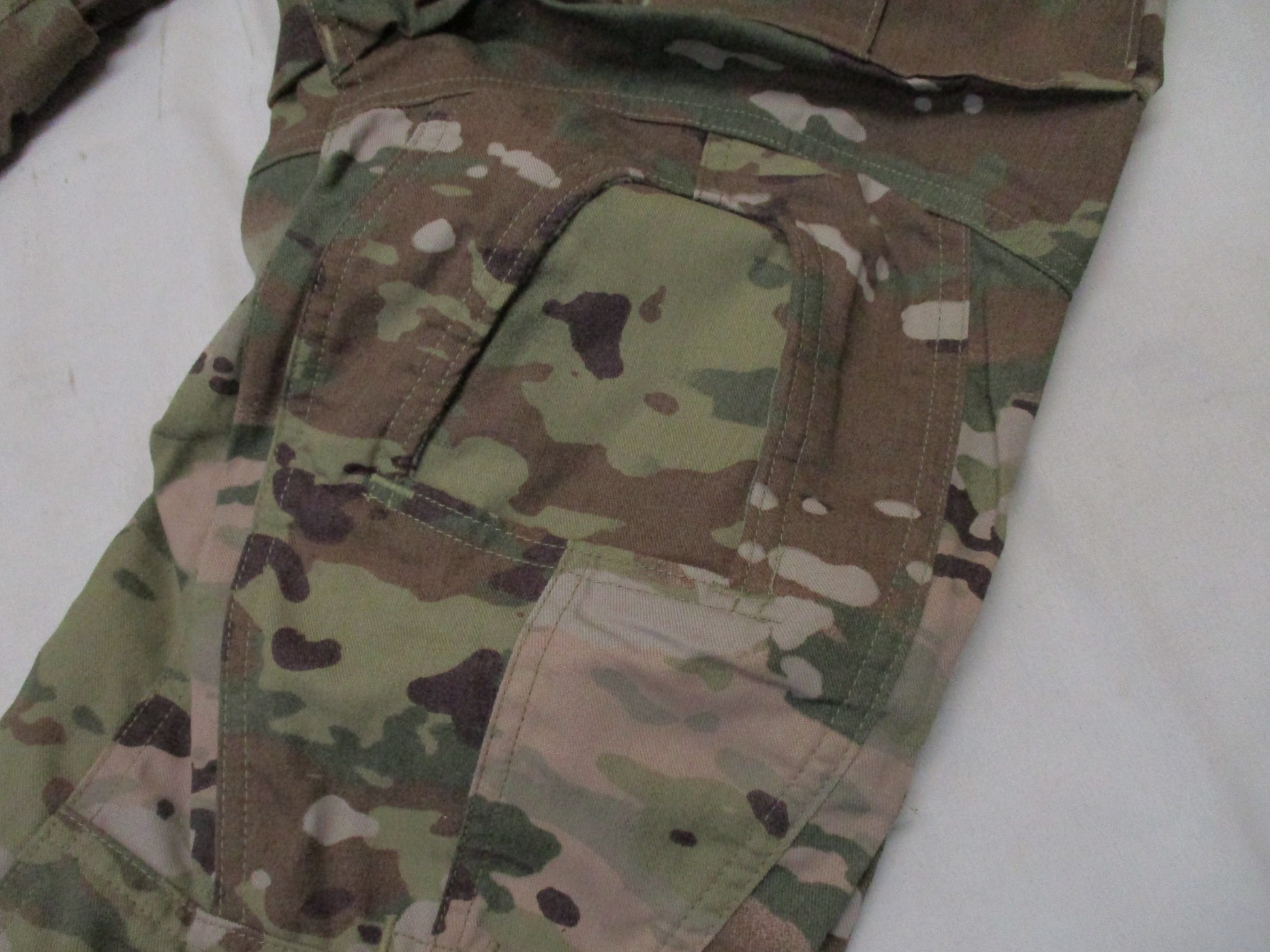 Army combat pants in Scorpion OCP camouflage with Crye knee pad compatibility, medium/short size, worn by a soldier.