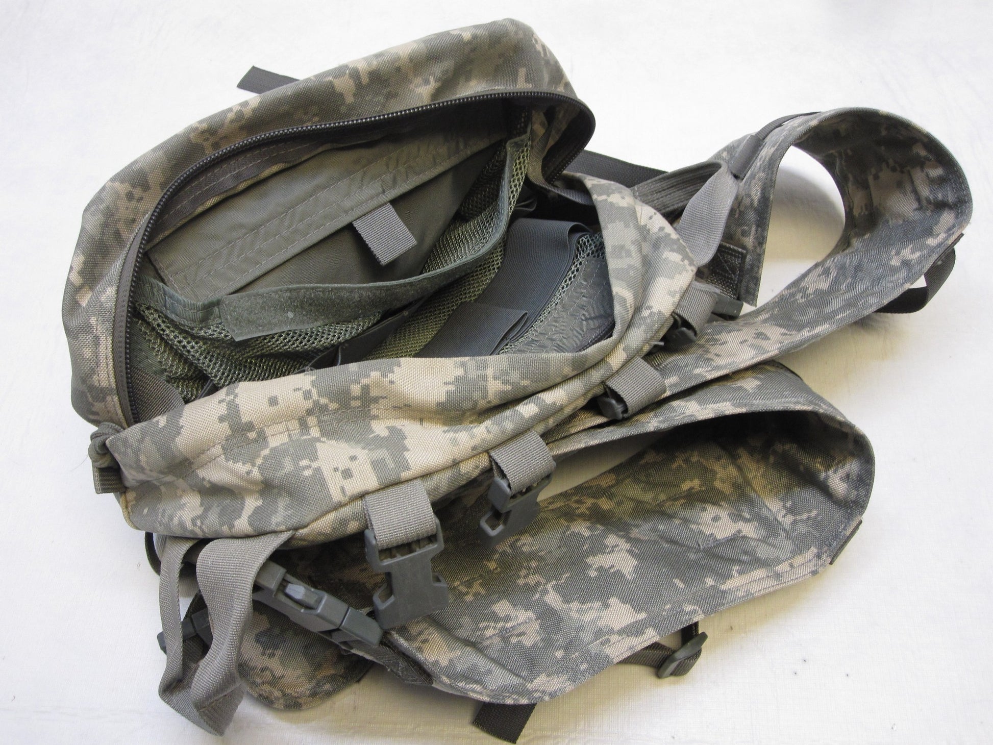 Empty USGI CLS Medical Bag in ACU Digital camouflage with Centex Military Gear branding, featuring multiple compartments and zippers.