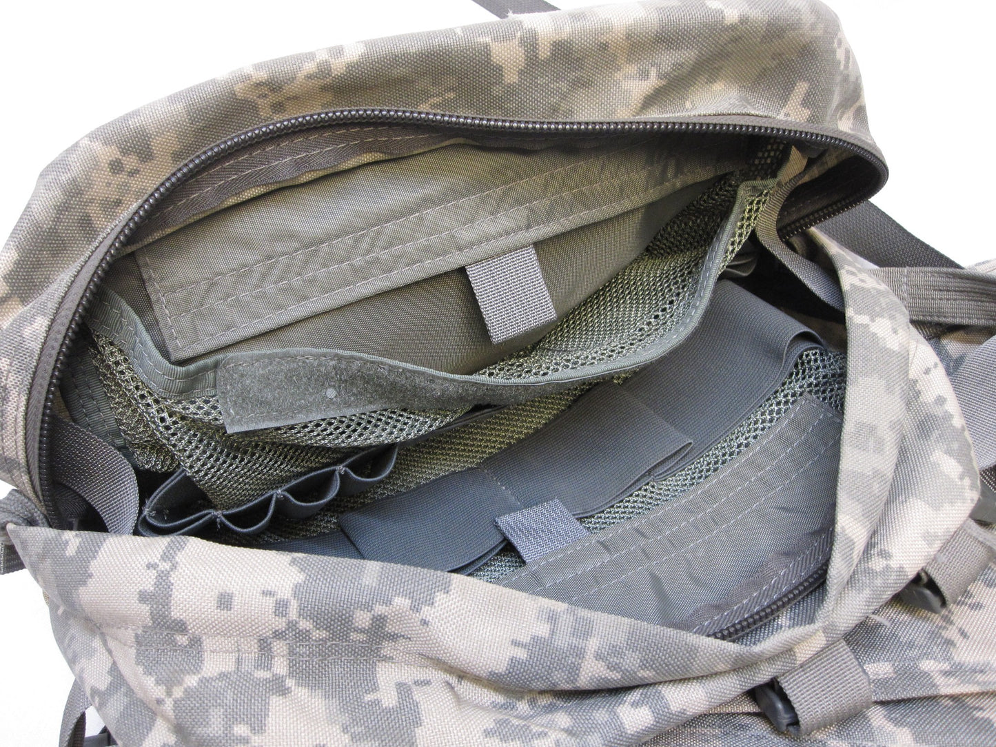 Empty USGI CLS Medical Bag in ACU Digital camouflage with Centex Military Gear branding, featuring multiple compartments and zippers.