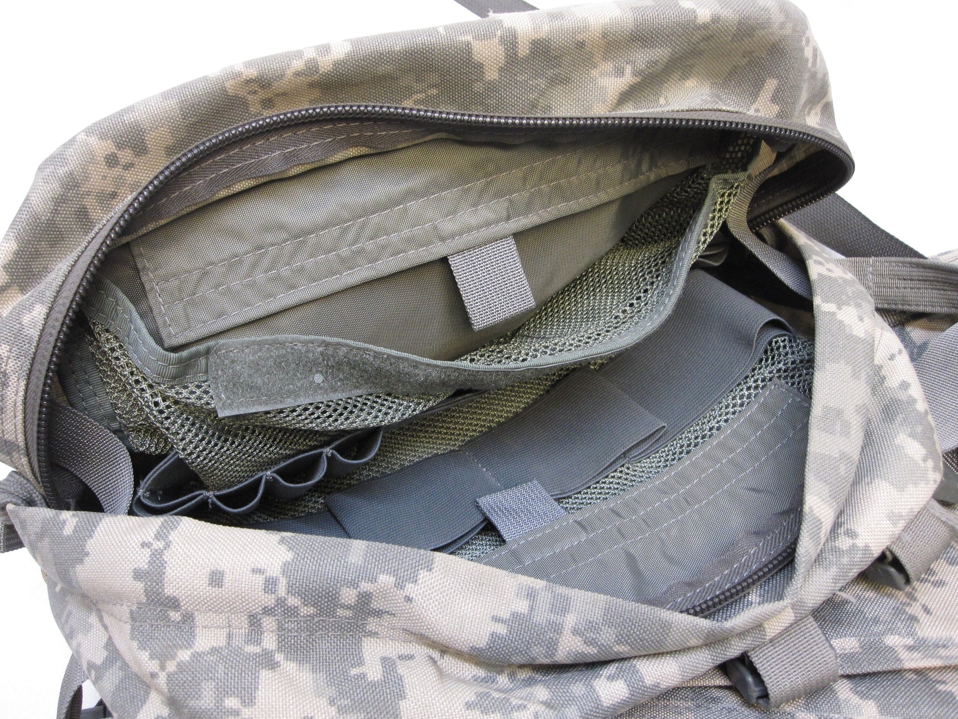 Empty USGI CLS Medical Bag in ACU Digital camouflage with Centex Military Gear branding, featuring multiple compartments and zippers.