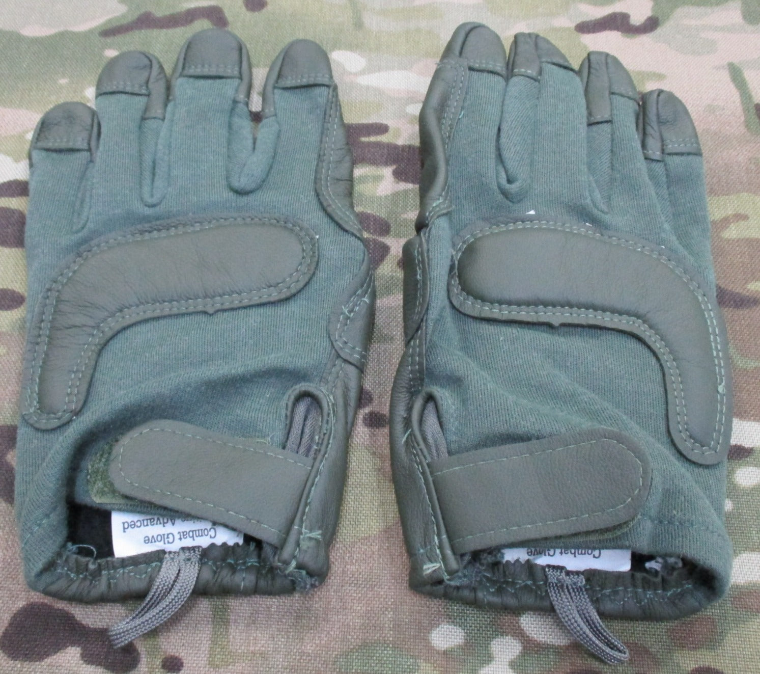Sage green US Army combat gloves, cut and fire resistant, size X-large, by Hatch HWI, displayed on a neutral background.