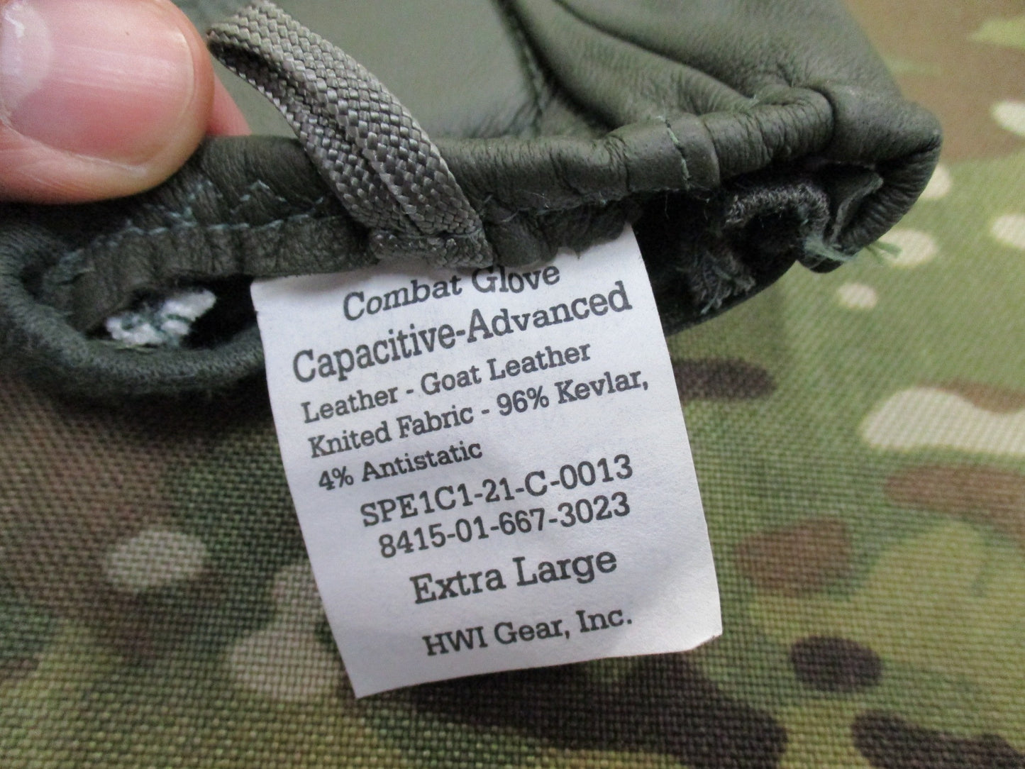 X-Large sage green US Army combat gloves, cut/fire resistant, by Hatch HWI, displayed on a neutral background.