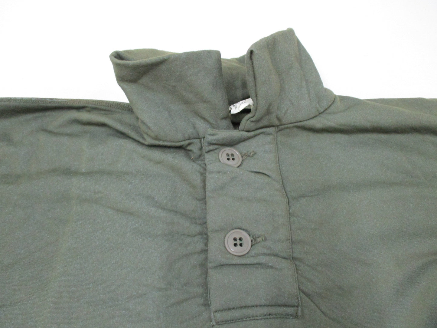 Vintage USGI Vietnam 1969 olive drab tricot knit shirt in small size, featuring a sleeping man's OG 106 design.