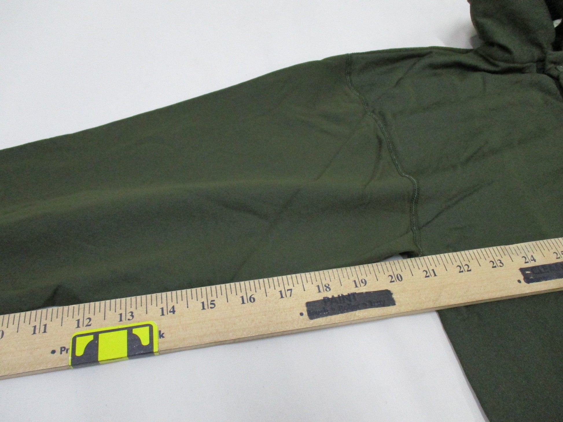 Olive drab Vietnam 1969 USGI shirt, small size, tricot knit top with sleeping man graphic, by Centex Military Gear.