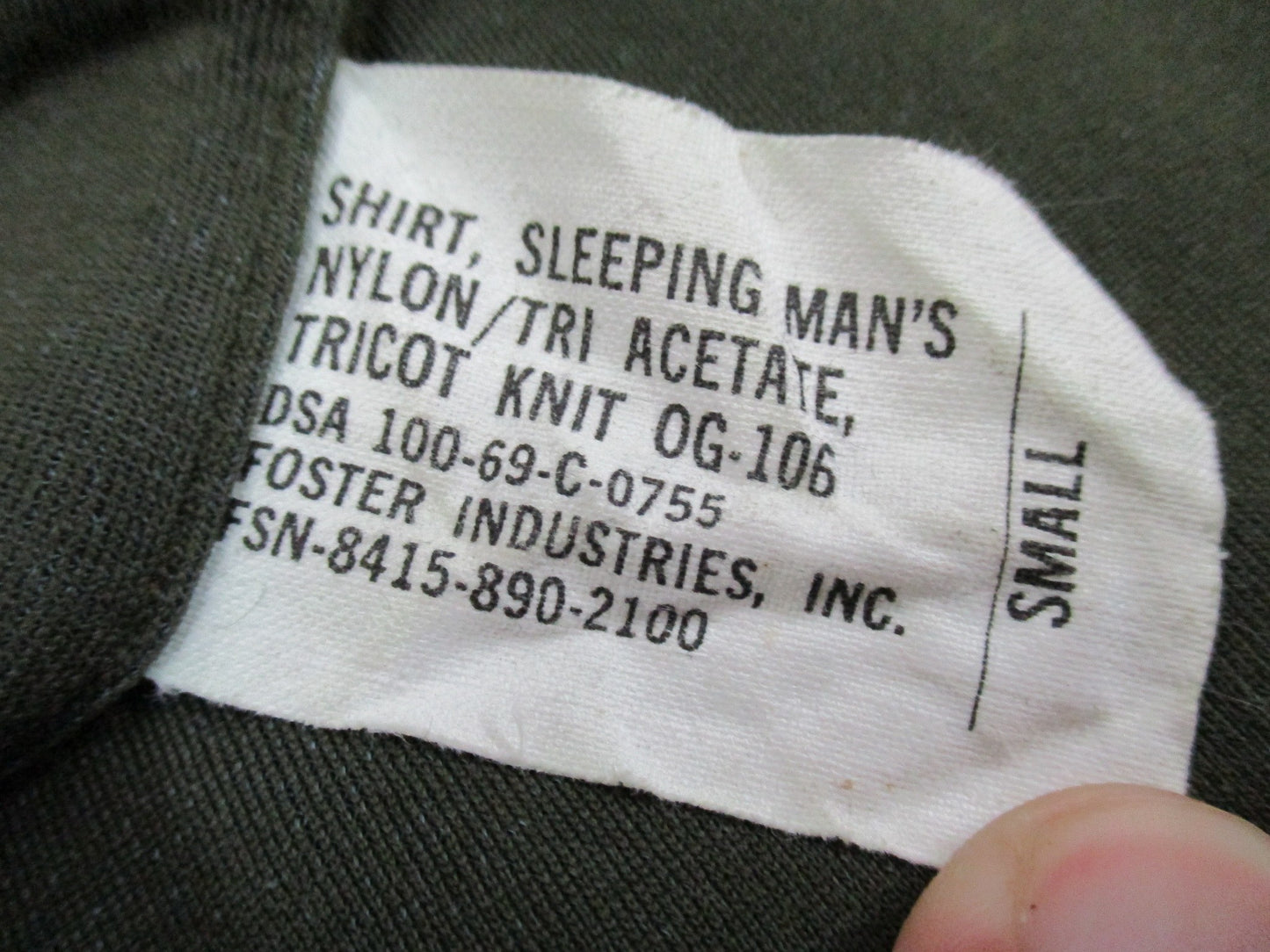 Olive drab Vietnam 1969 USGI tricot knit shirt in small size, featuring a sleeping man's OG 106 design by Centex Military Gear.