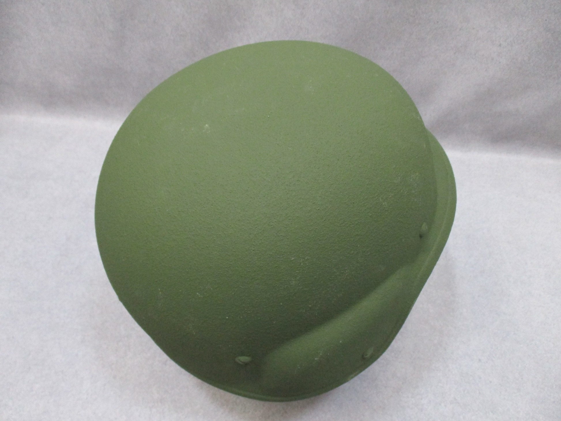 Large Centex Military Gear PASGT Kevlar helmet K-POT in olive green, showcasing a secure fit and protective design.