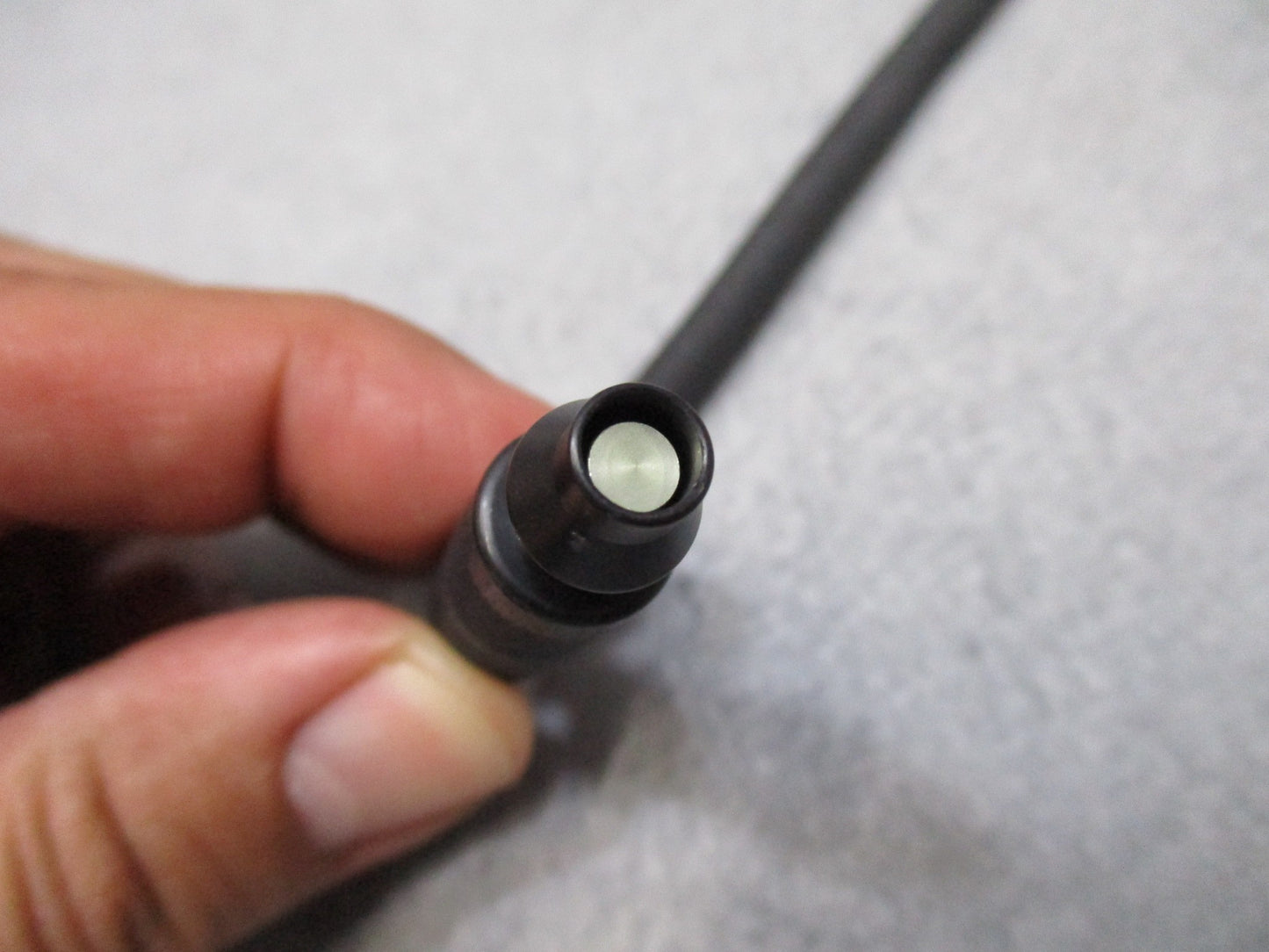 USGI M40 MCU-2A/P gas mask external drinking tube by Centex Military Gear against a plain background.