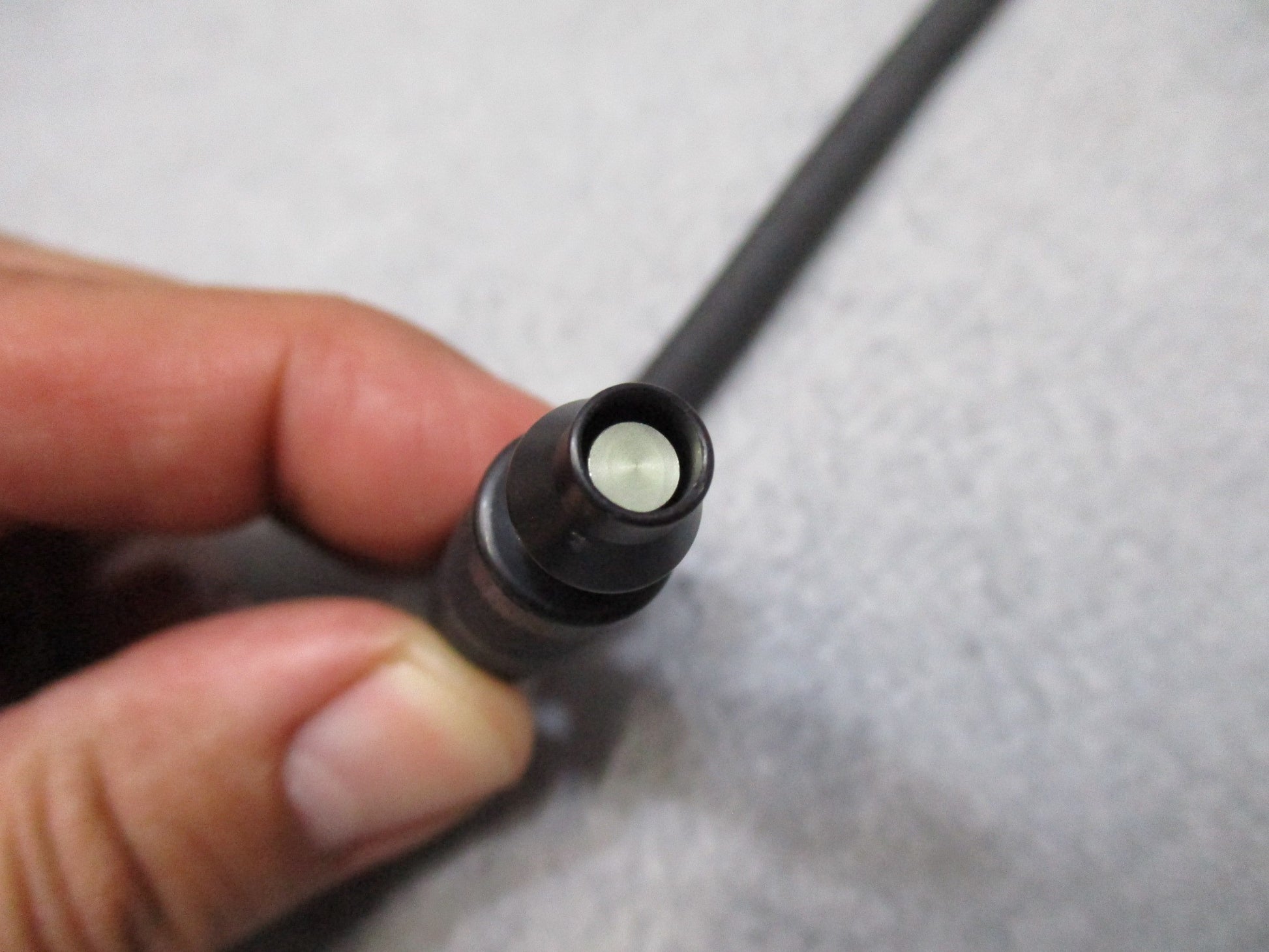 USGI M40 MCU-2A/P gas mask external drinking tube by Centex Military Gear against a plain background.