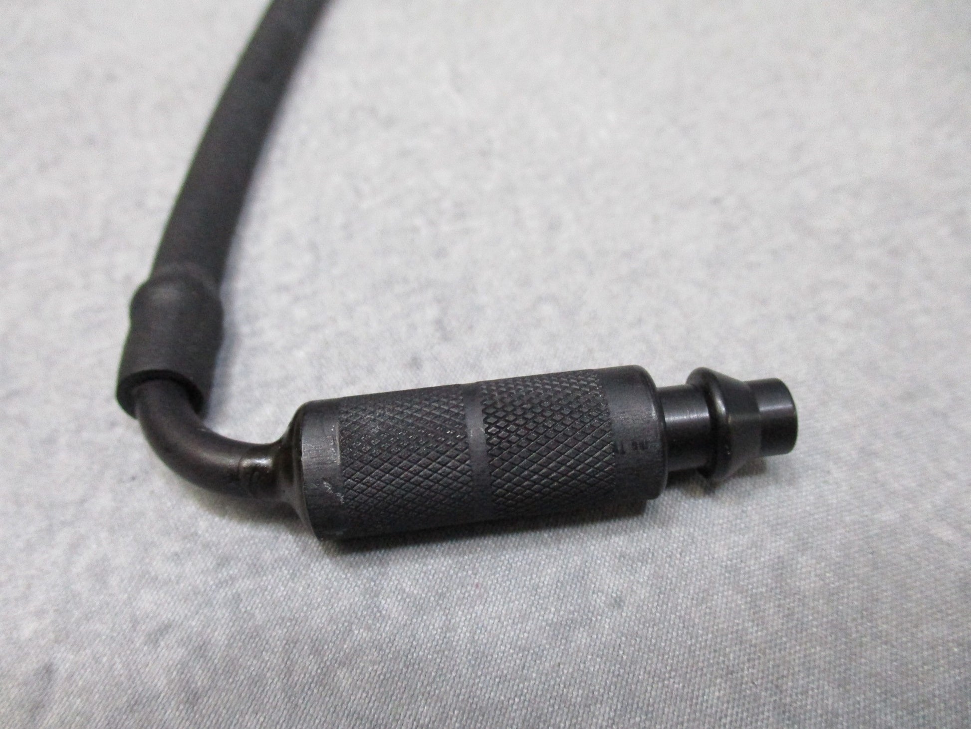 USGI M40/MCU-2A/P gas mask external drinking tube by Centex Military Gear, showing flexible tube and connection details.