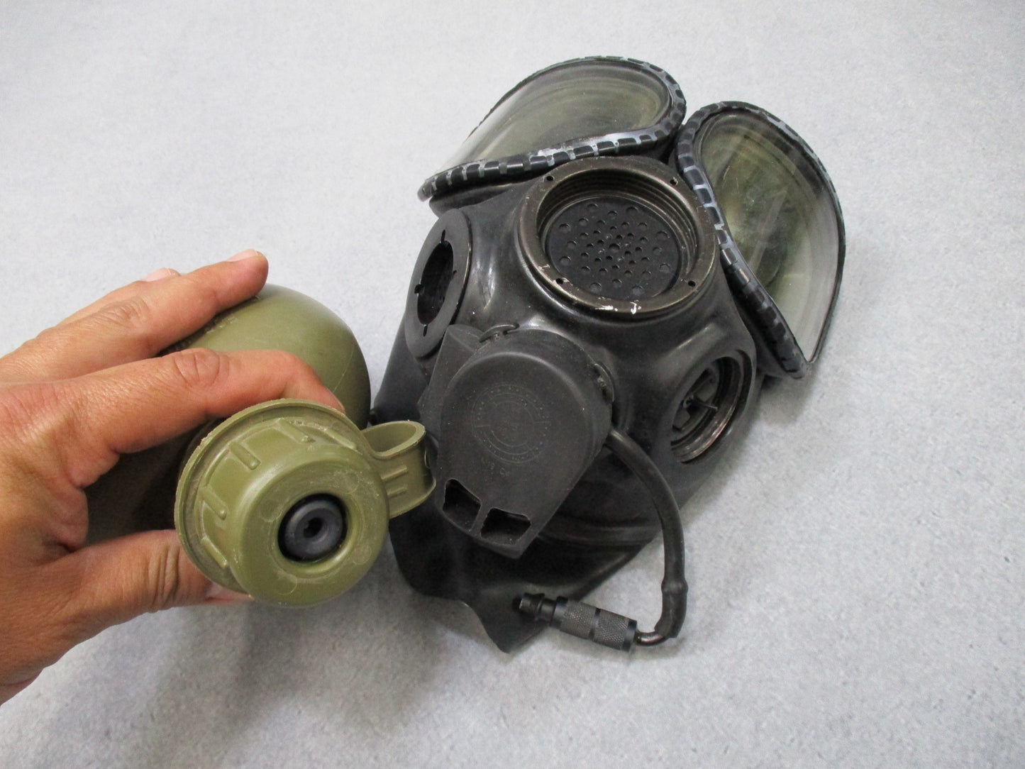 Centex Military Gear M40/MCU-2A/P gas mask with external drinking tube, showing detailed design and military surplus features.