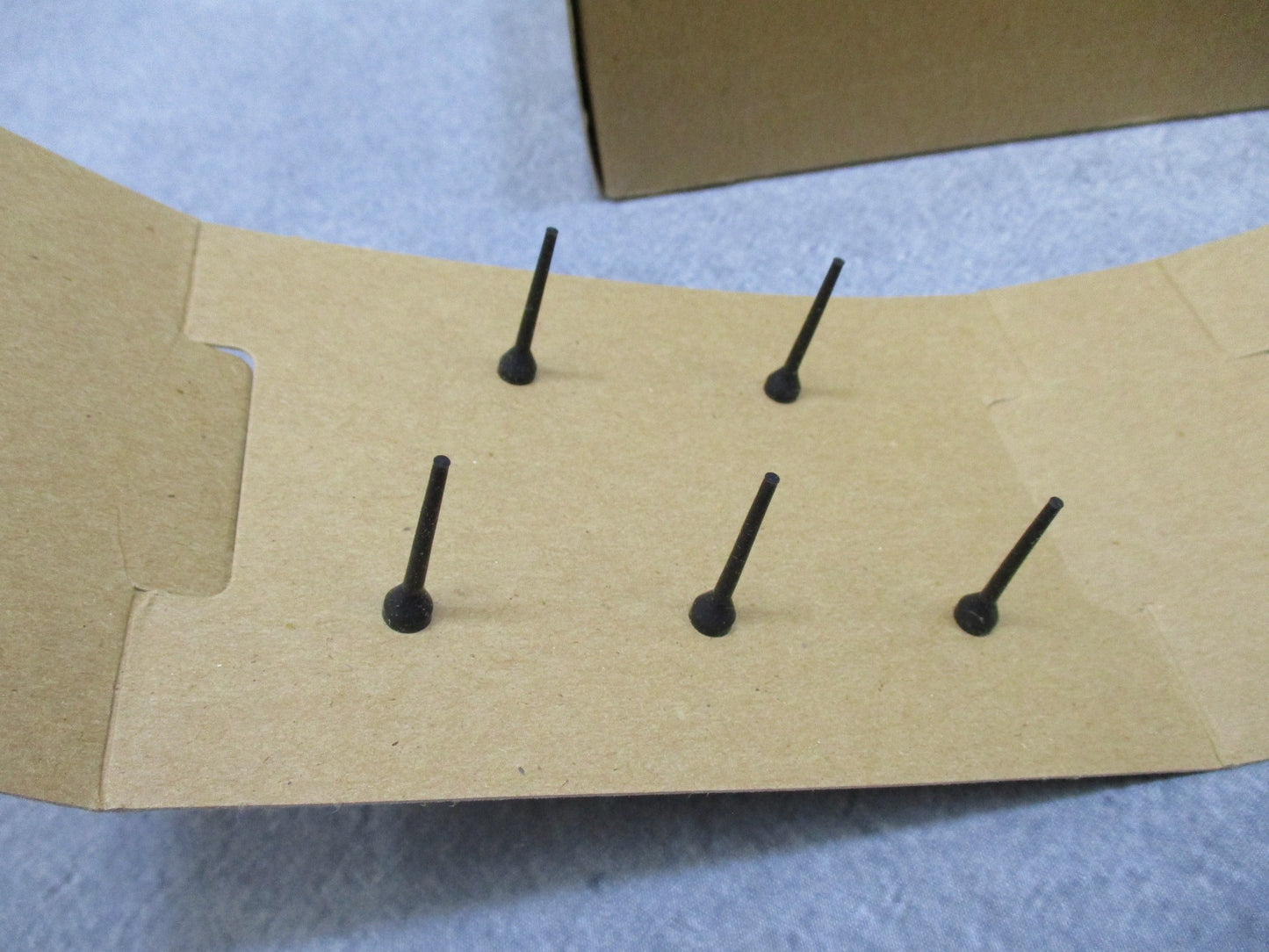 Centex Military Gear USGI M40 gas mask outlet valve disks in a 10 pack, showing detailed valve disk design.