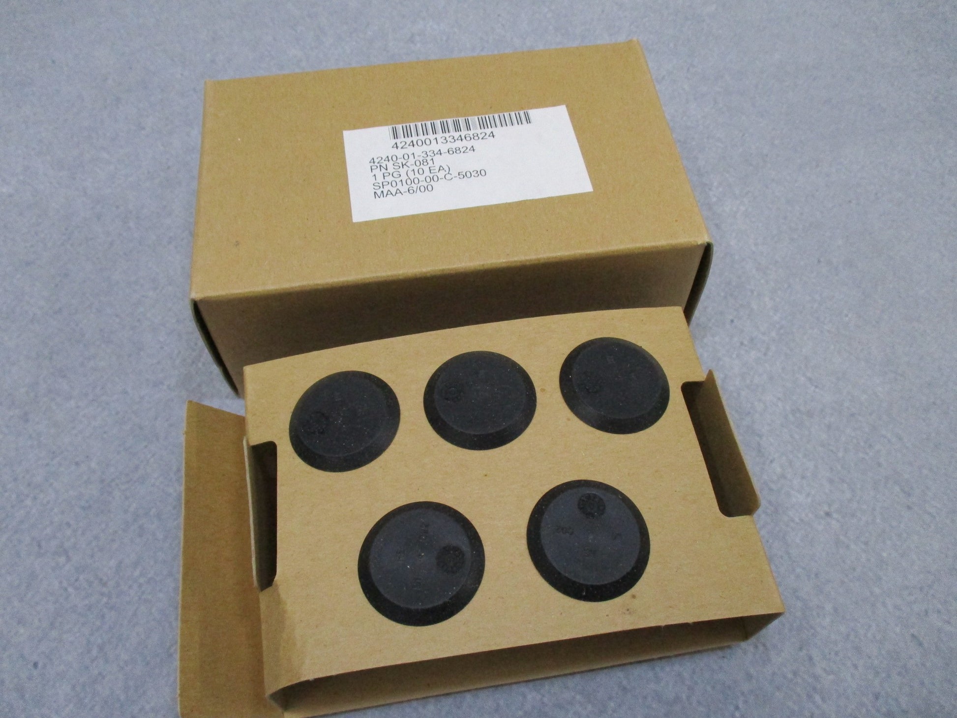 USGI M40 gas mask outlet valve disks in a 10 pack, featuring NOS MCU-2A/P Millennium valve design by Centex Military Gear.