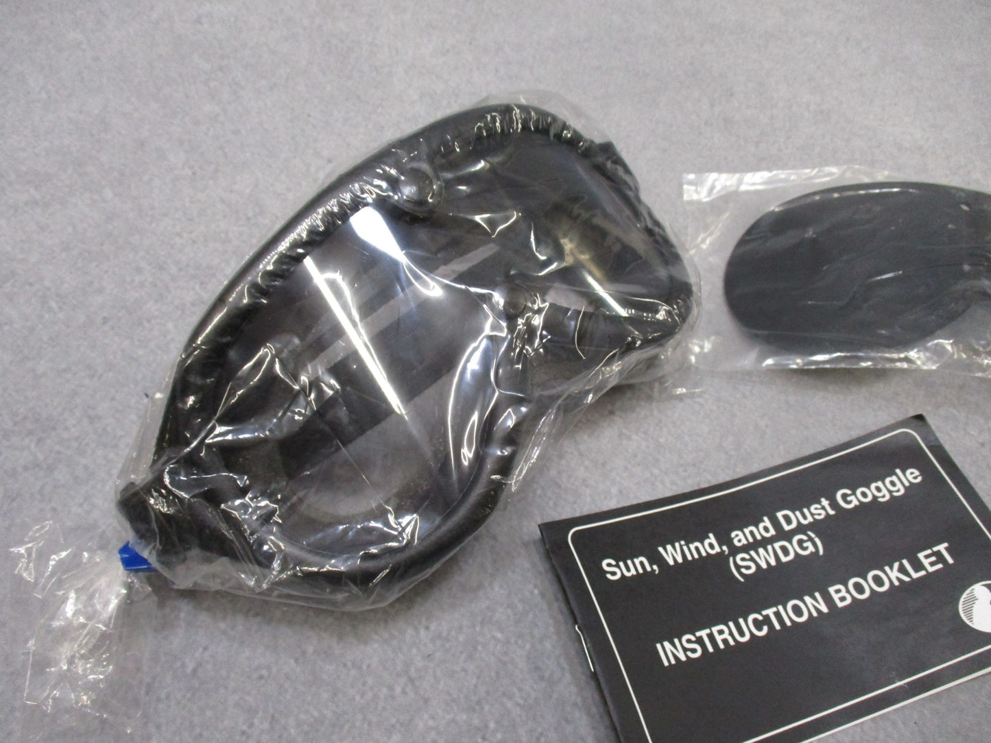 Vintage USGI military goggles by Centex Military Gear with dual lenses for sun, wind, and dust protection.