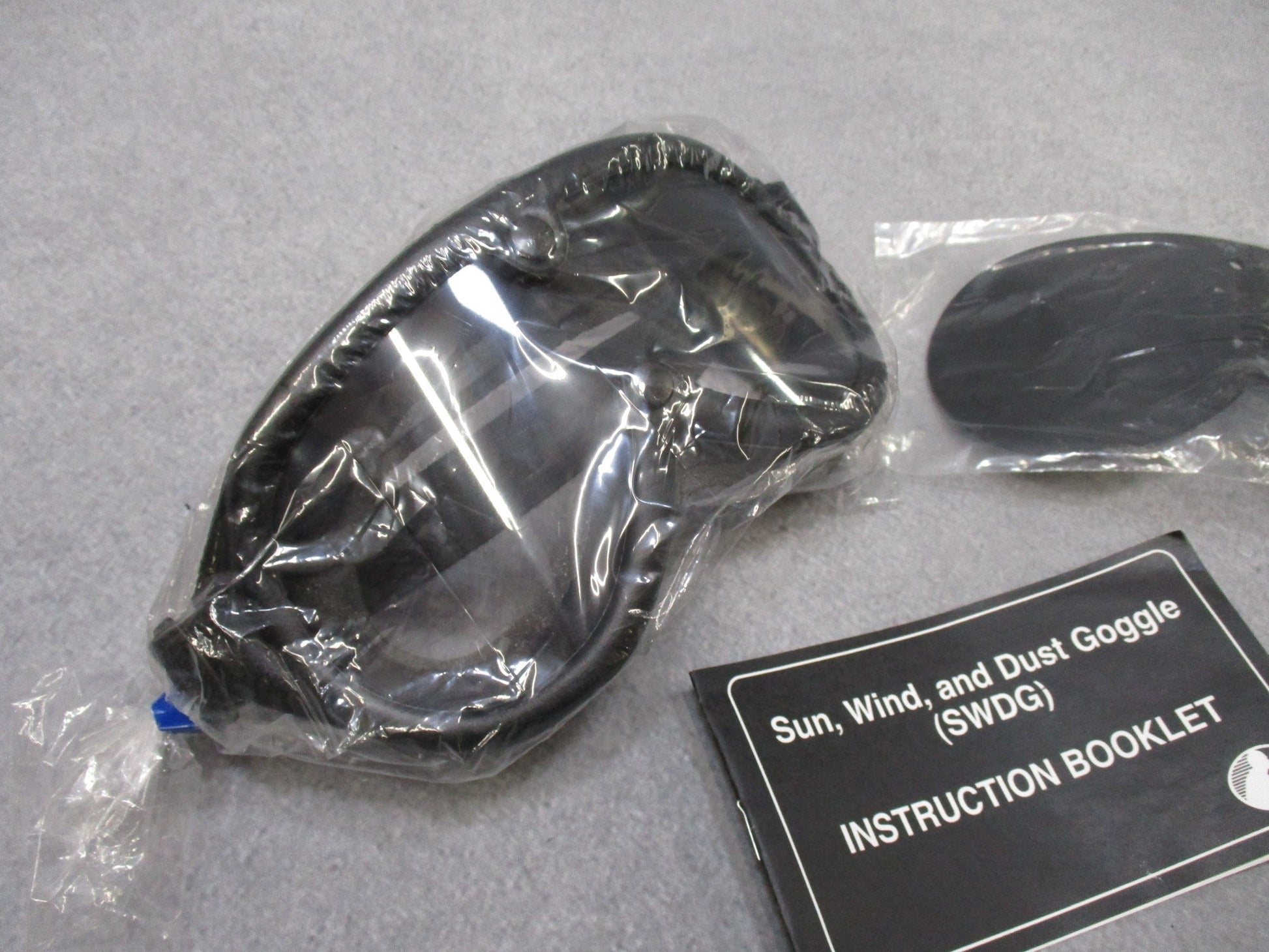 Vintage USGI military goggles by Centex Military Gear with dual lenses for sun, wind, and dust protection.