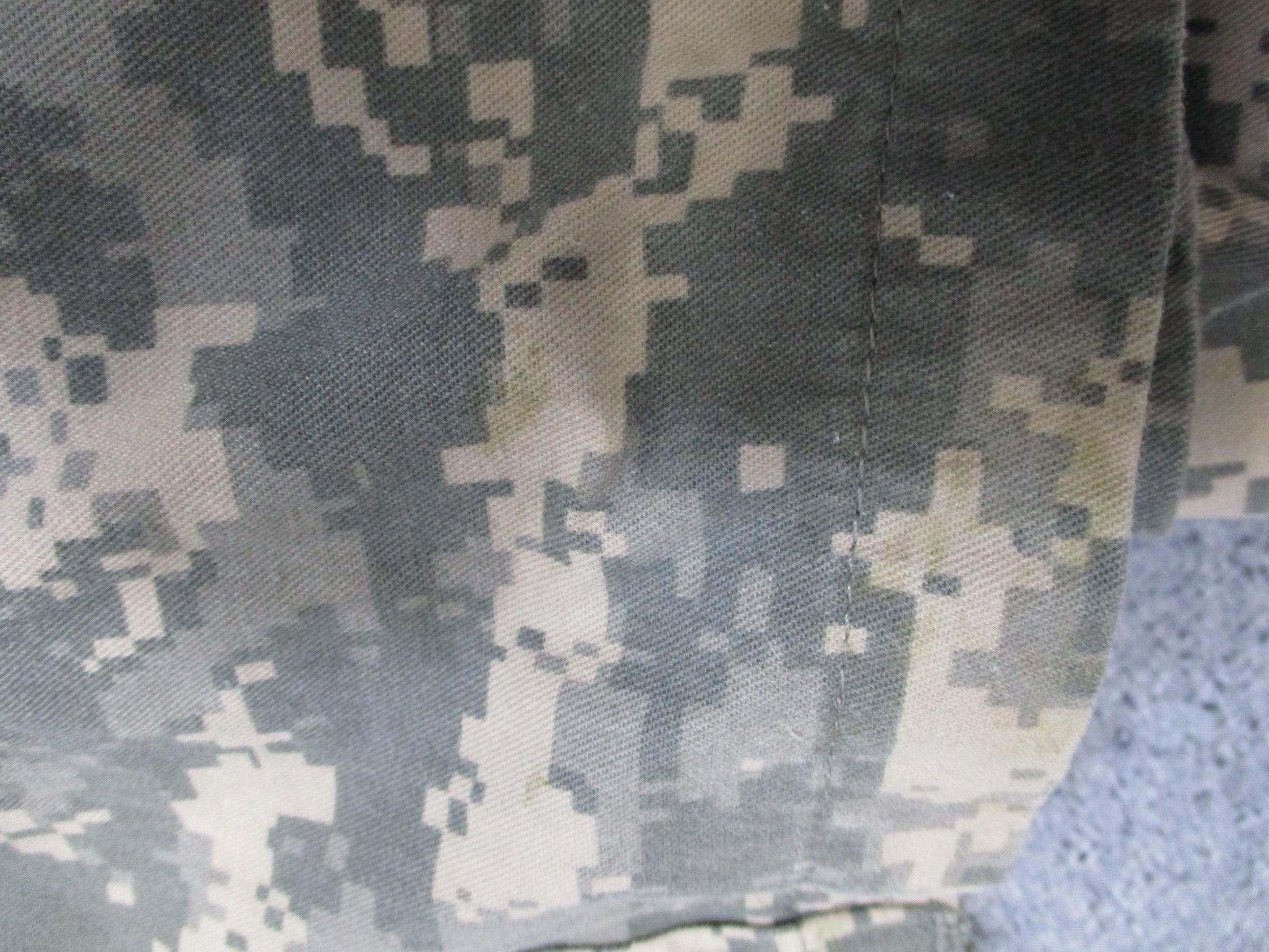 US Army issue mechanic coveralls Type III UCP ACU digital in size X-Large, featuring a rugged design and multiple pockets.