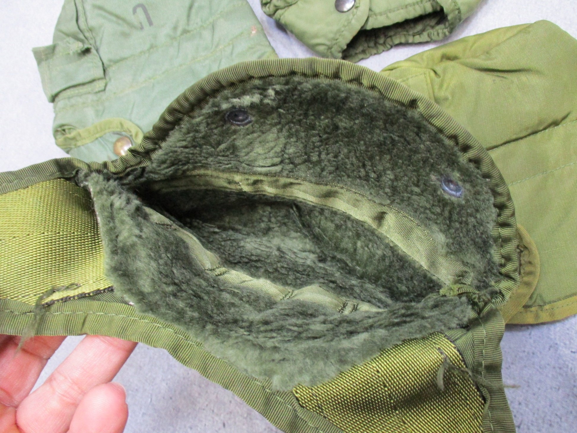 Four OD green military canteen covers with ALICE clips, insulated design by Centex Military Gear.