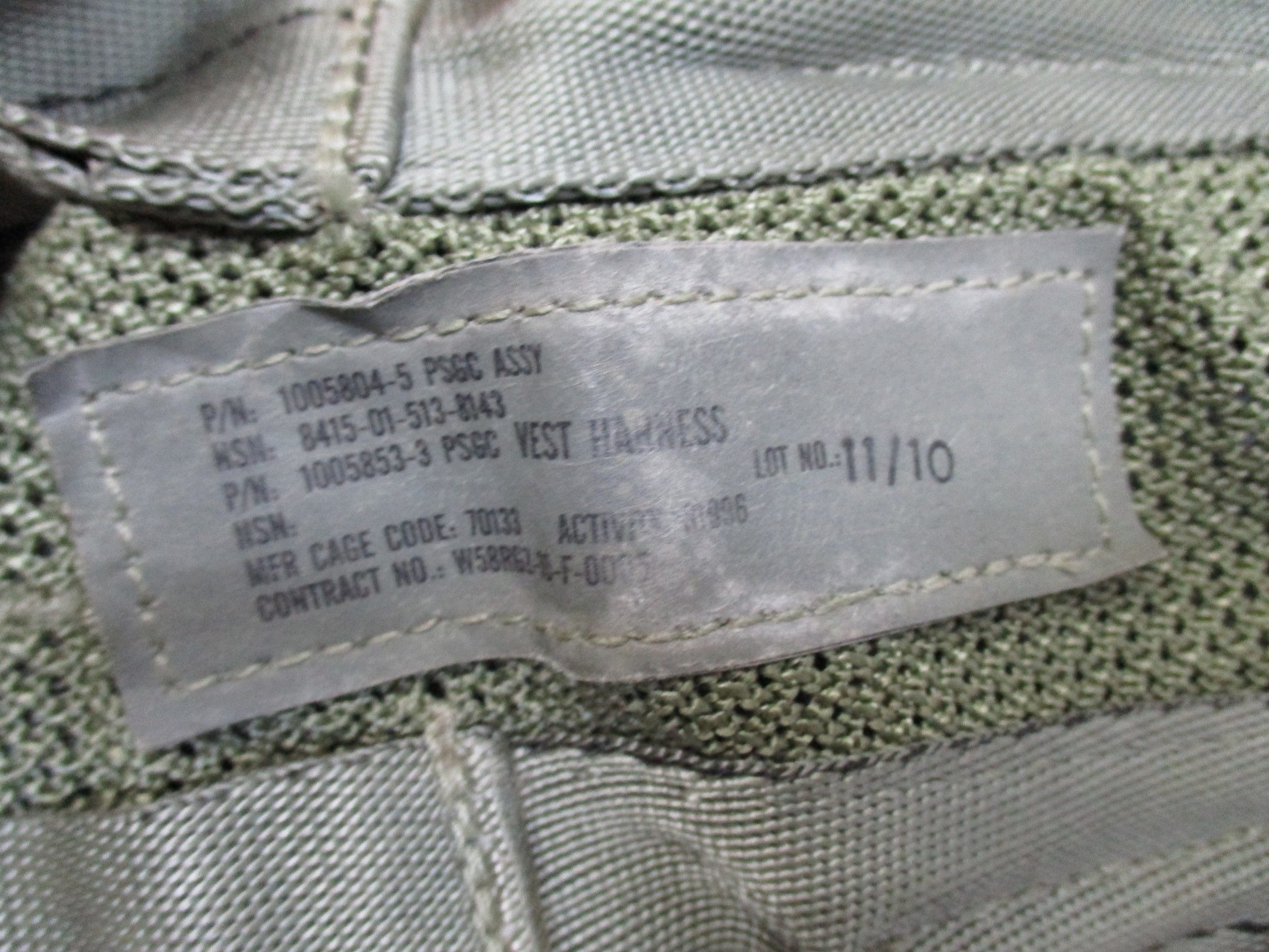 US Army Aviation Air Warrior vest harness by Centex Military Gear, featuring digital design for aircrew survival and extraction.