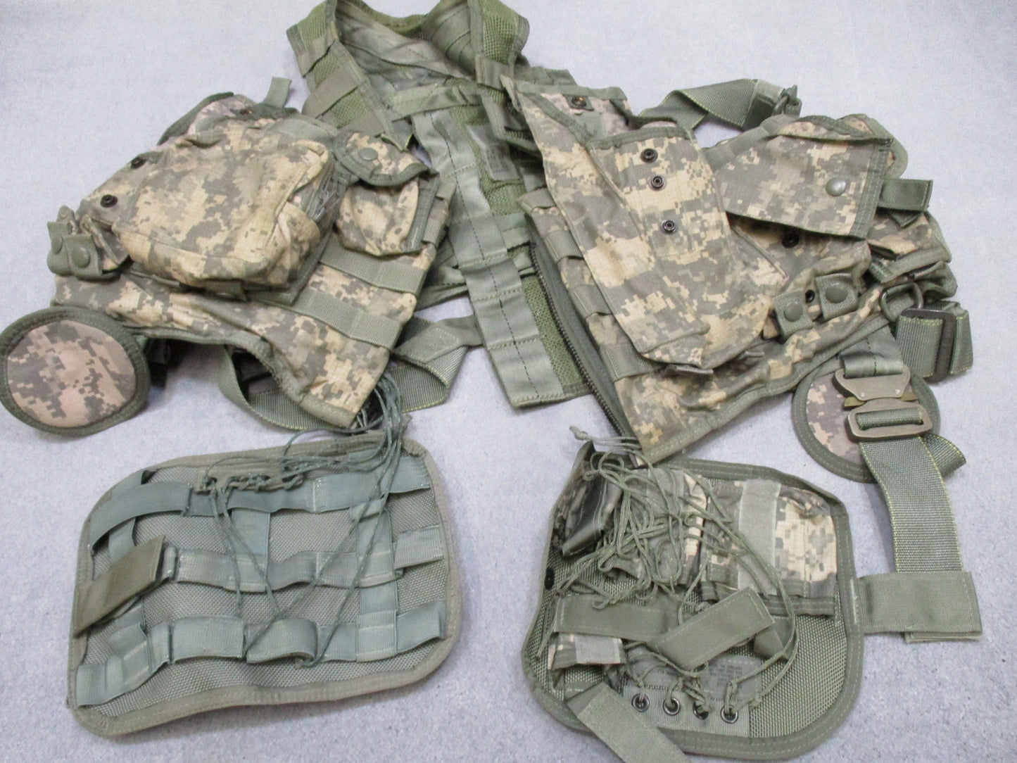 US Army Aviation Air Warrior vest harness by Centex Military Gear, featuring digital camouflage and survival extraction equipment.