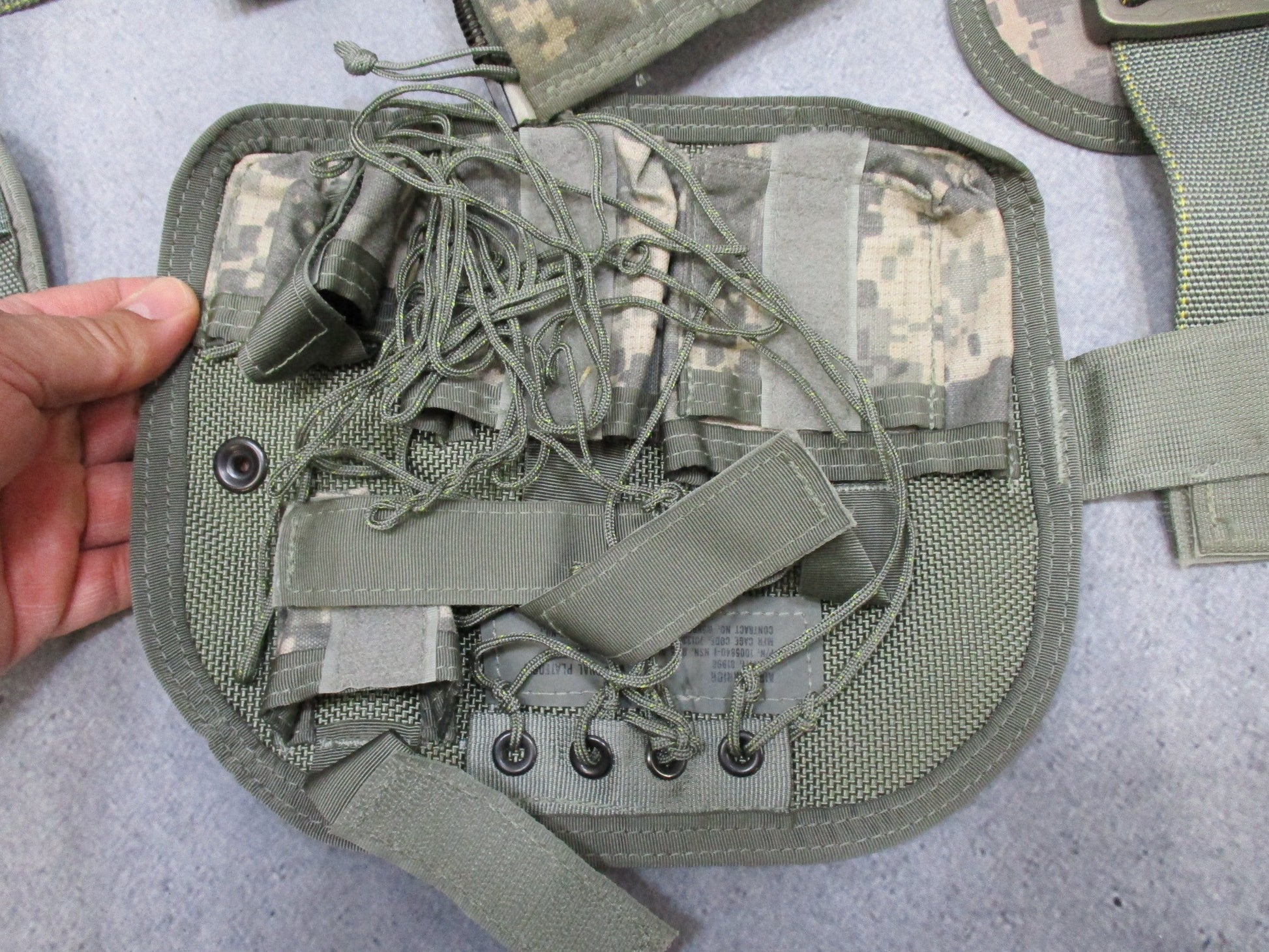 US Army Aviation Air Warrior vest harness with digital aircrew survival and extraction features, used by military personnel.