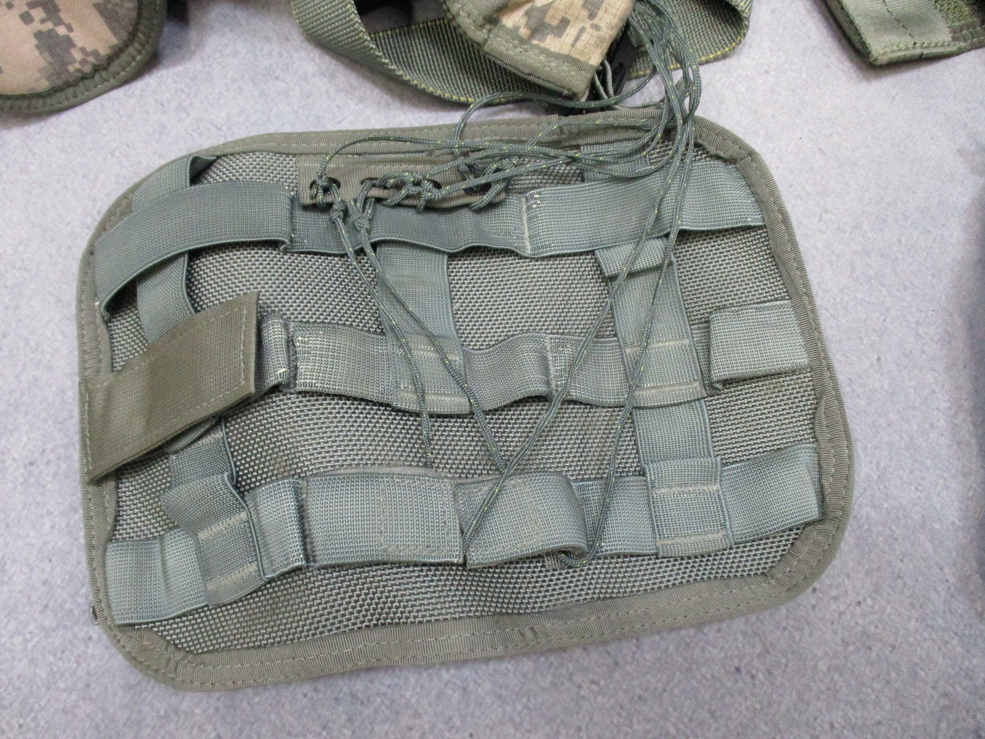 US Army Aviation Air Warrior vest harness by Centex Military Gear, featuring digital camouflage design for aircrew survival and extraction