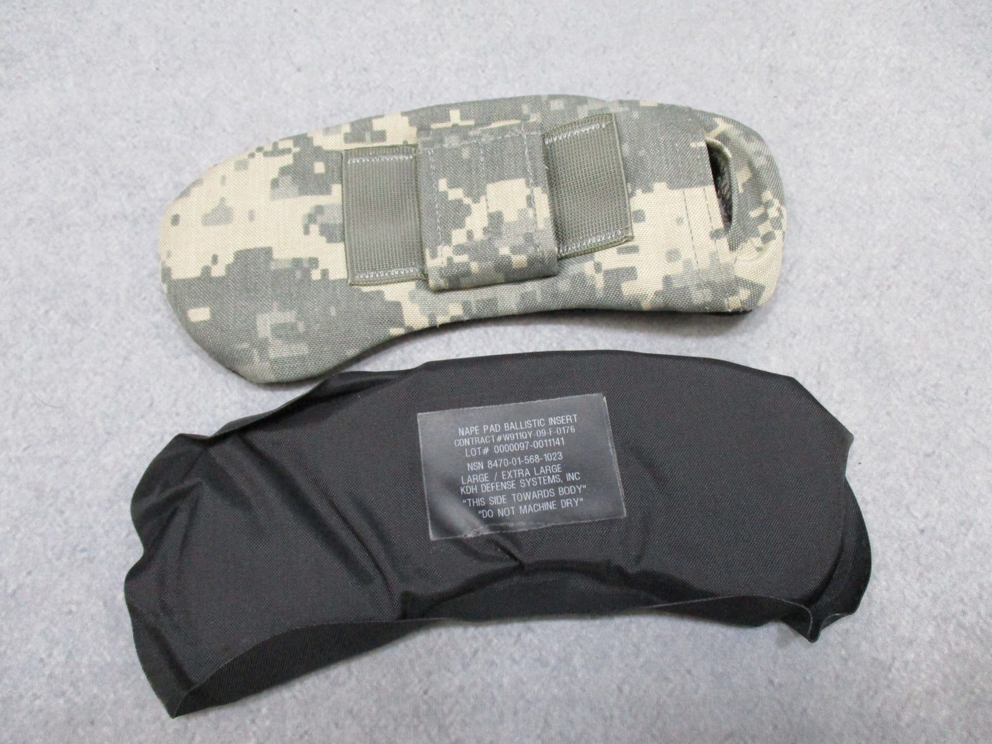 Used Centex Military Gear army issue ACU digital nape pad in large/X-large size, showing the padded fabric and camouflage pattern.