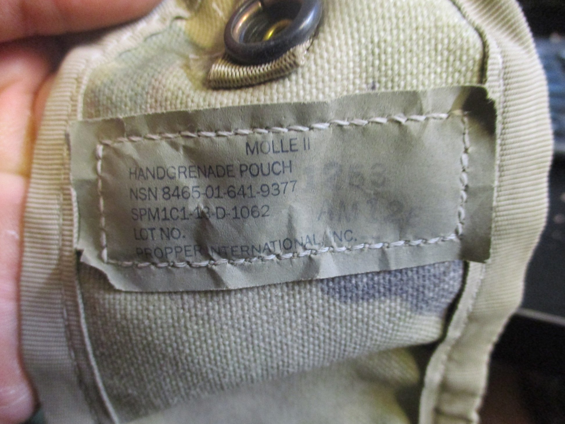 Used USGI army issue frag grenade MOLLE pouch in OCP Scorpion camo, designed for military gear storage by Centex Military Gear