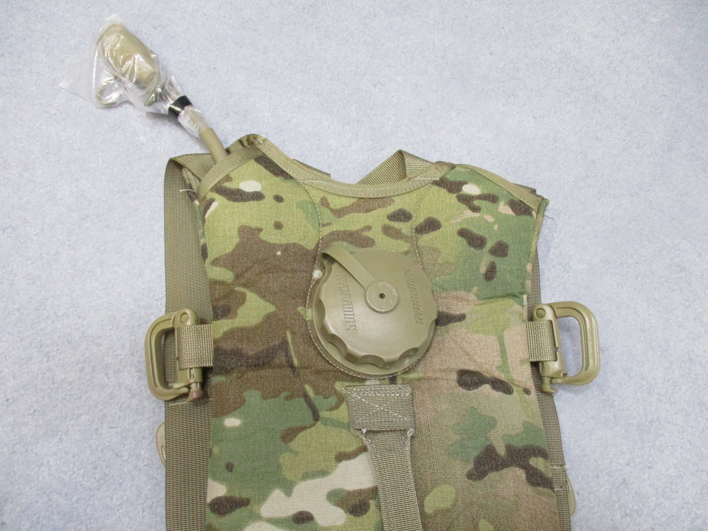 Centex Military Gear Army Issue MOLLE hydration system with CamelBak water pack and bladder in Multicam OCP camouflage.
