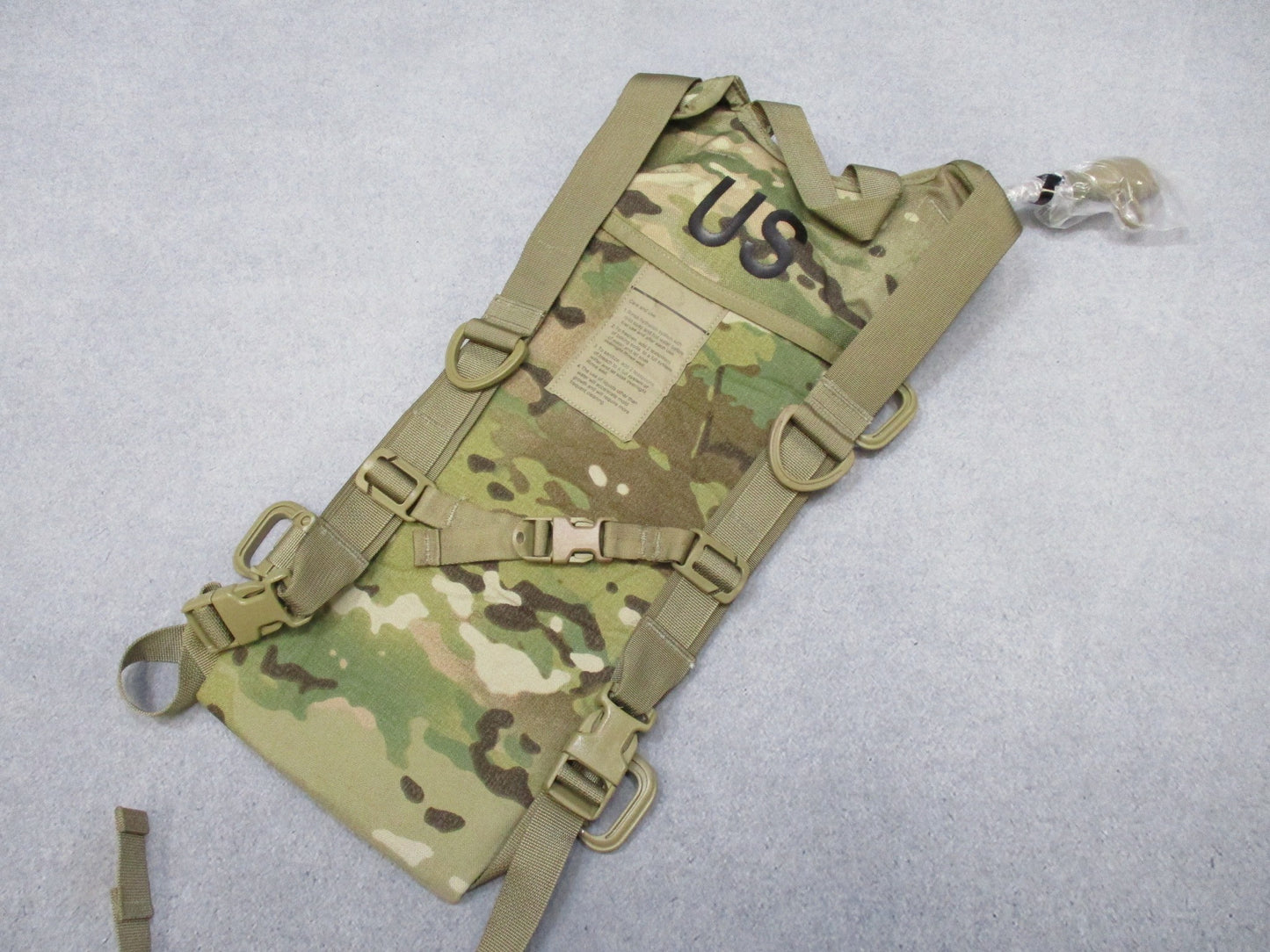 Centex Military Gear Army Issue MOLLE hydration system with CamelBak water pack and bladder in Multicam OCP camouflage.