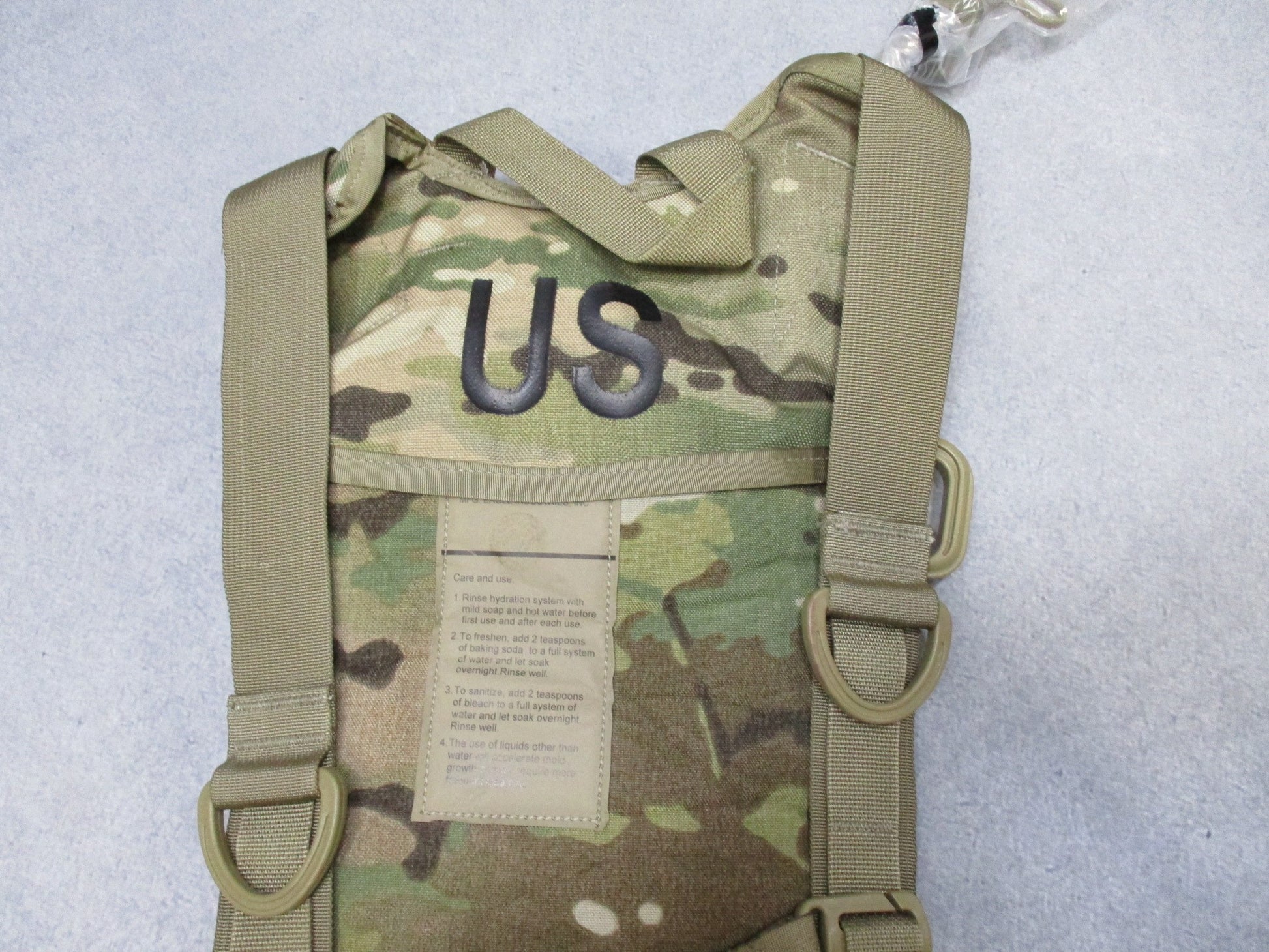 Centex Military Gear Army Issue Molle Hydration System with CamelBak water bladder in Multicam OCP camouflage.