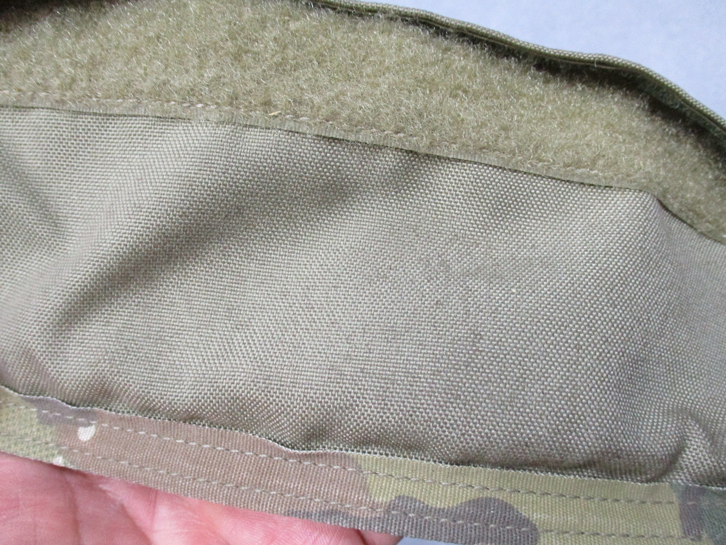 Used Multicam lower back protector butt pad from Centex Military Gear in Army OCP camouflage, showing padded design and camouflage pattern.