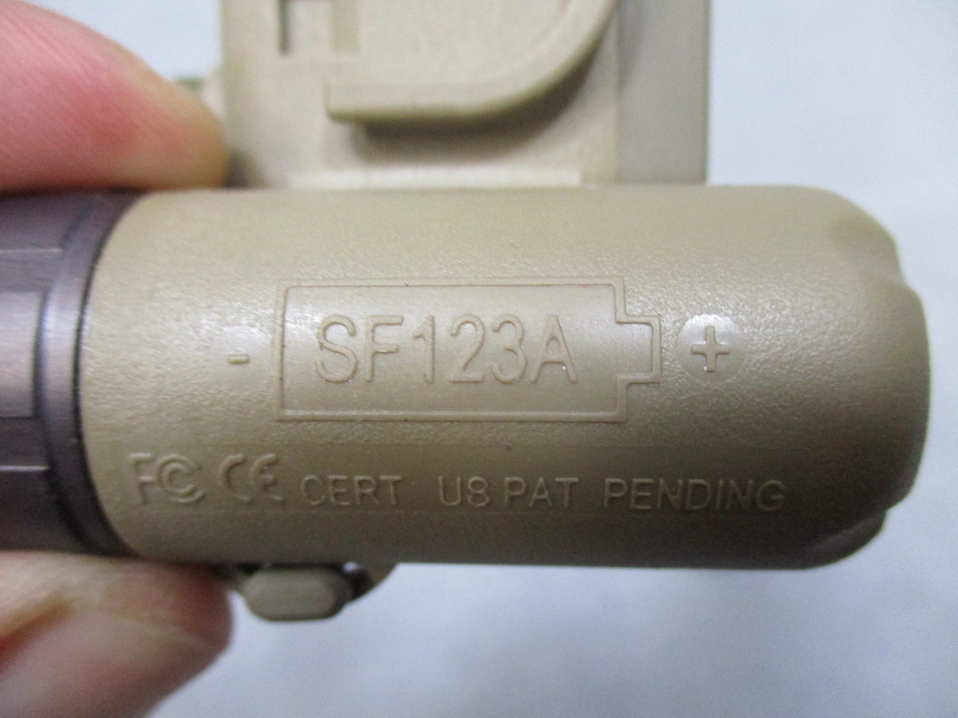 Centex Military Gear Army tan SureFire helmet light with white/blue LED, IR strobe, IR ach/MICH mount on helmet.