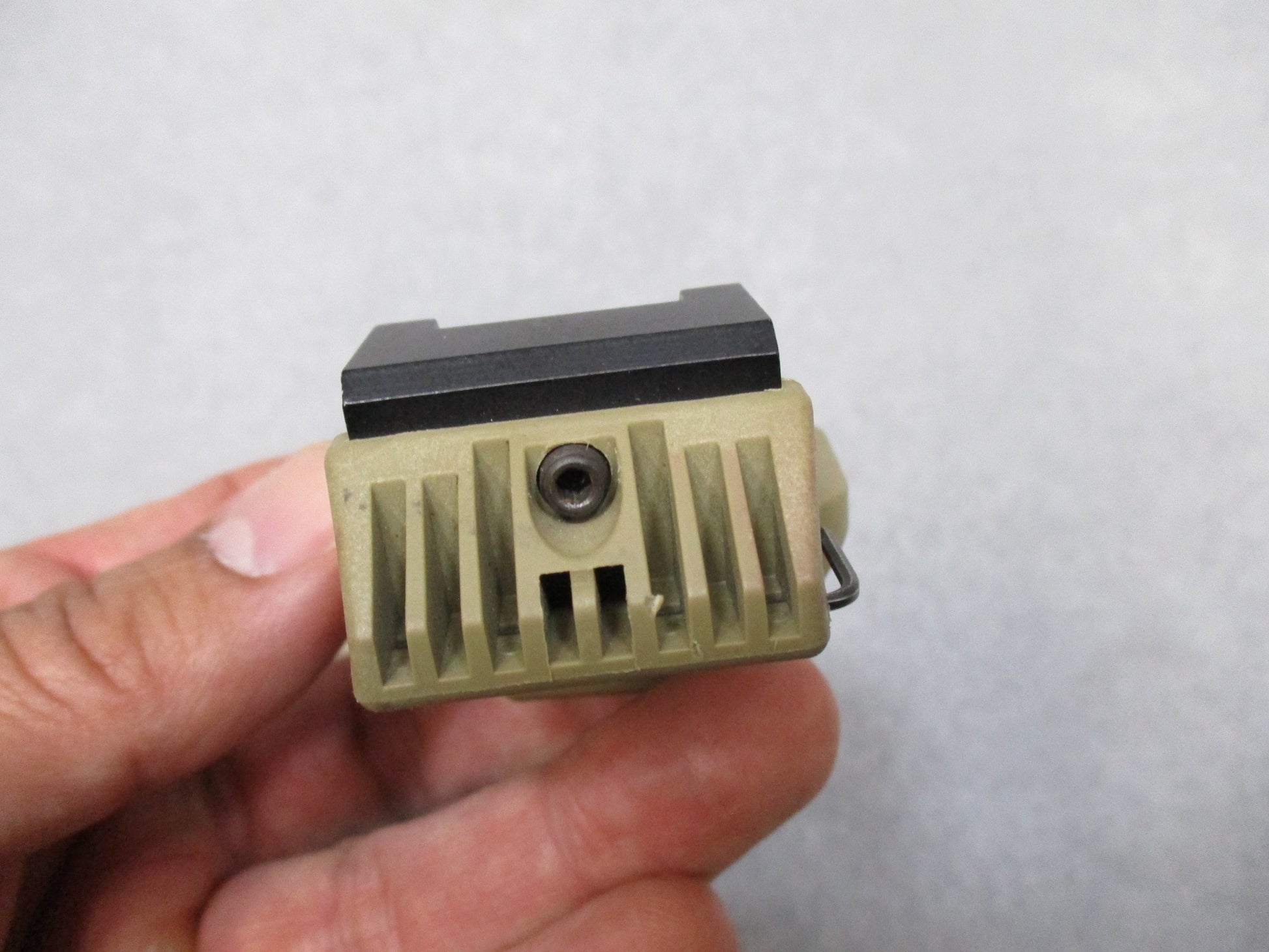 Army tan SureFire helmet light with white and blue LEDs, IR strobe, mounted on ACH/MICH helmet, used by Centex Military Gear